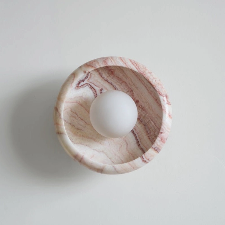 Modern marble wall lamp interior design focal point natural materials