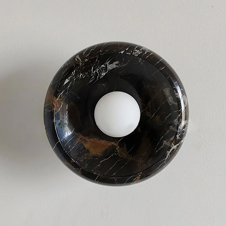 Marble wall lamp product display showcasing natural stone craftsmanship and modern fixture integration