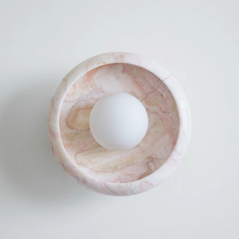 Marble wall lamp natural veining detail showcasing unique stone characteristics