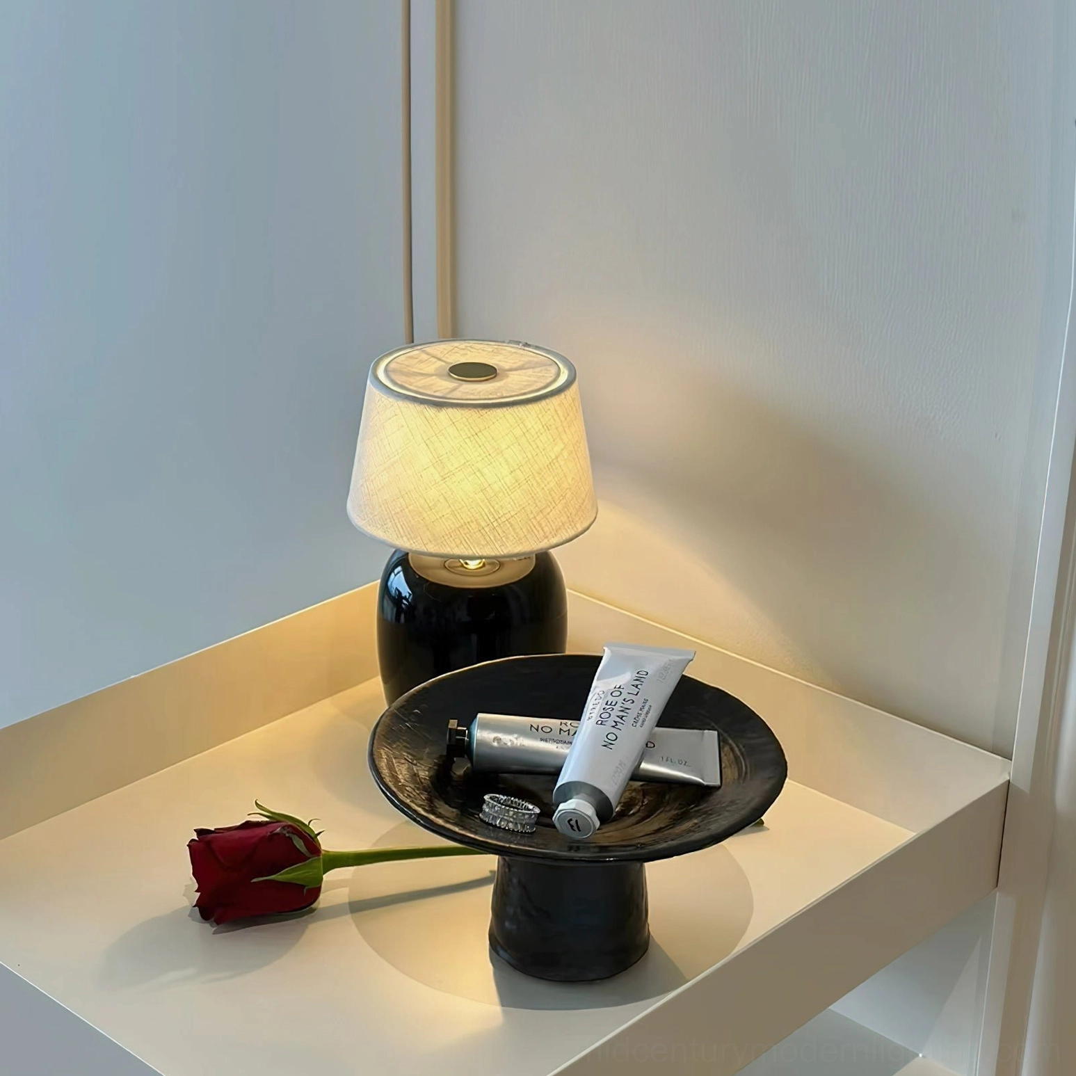 Marie table lamp warm LED illumination creating ambient lighting in interior space