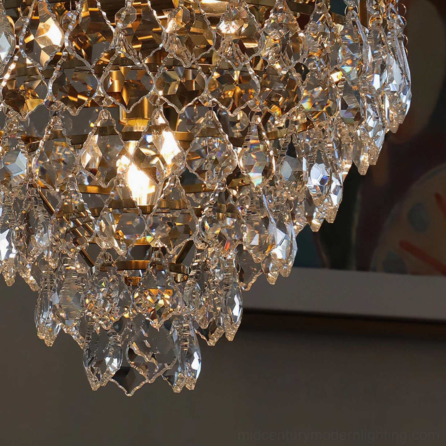 Marilyn Crystal Chandelier bottom view looking upward, symmetric crystal arrangement and central socket with gold metal canopy