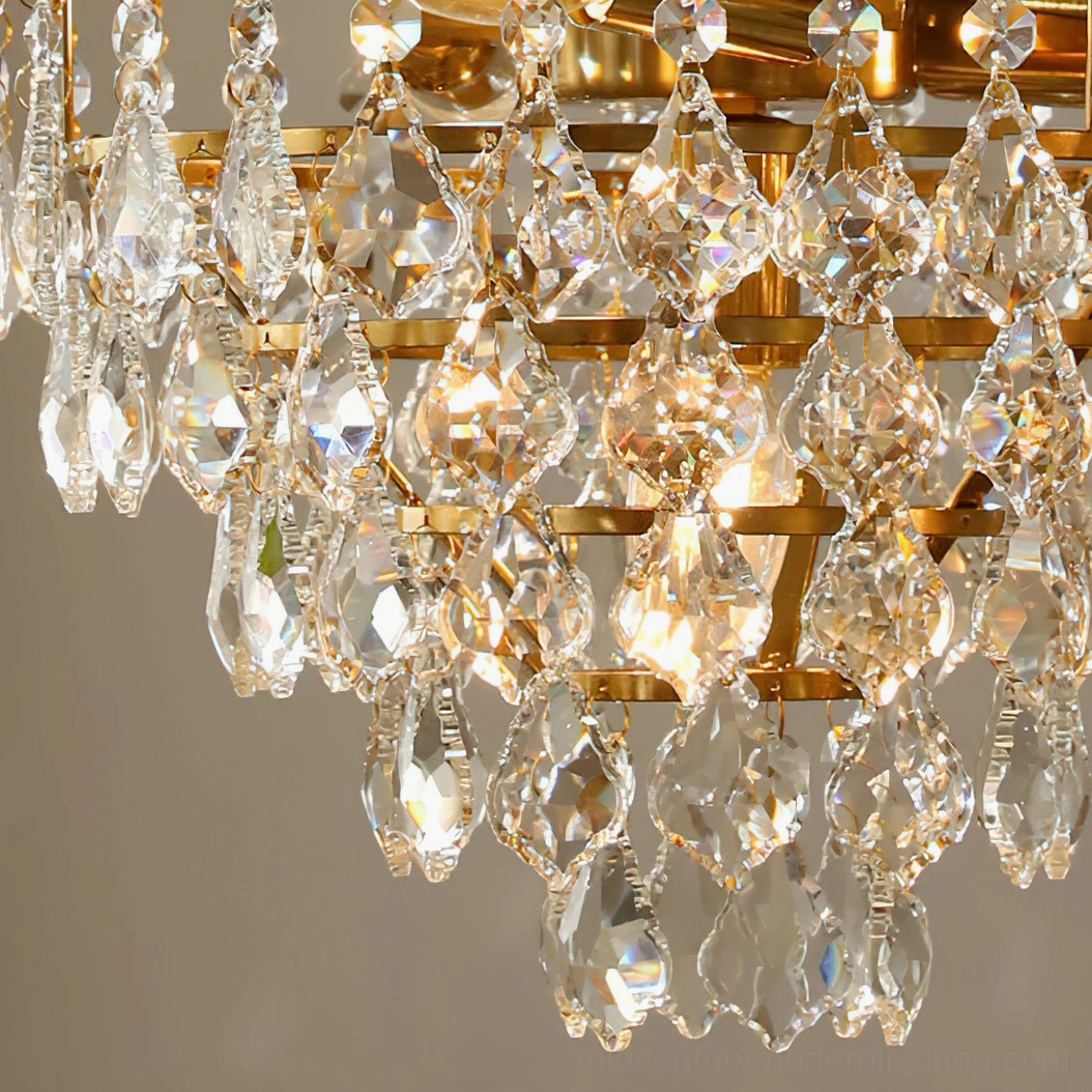 Marilyn Crystal Chandelier front profile view, sculptural geometric design with individual positioned crystal facets on gold frame