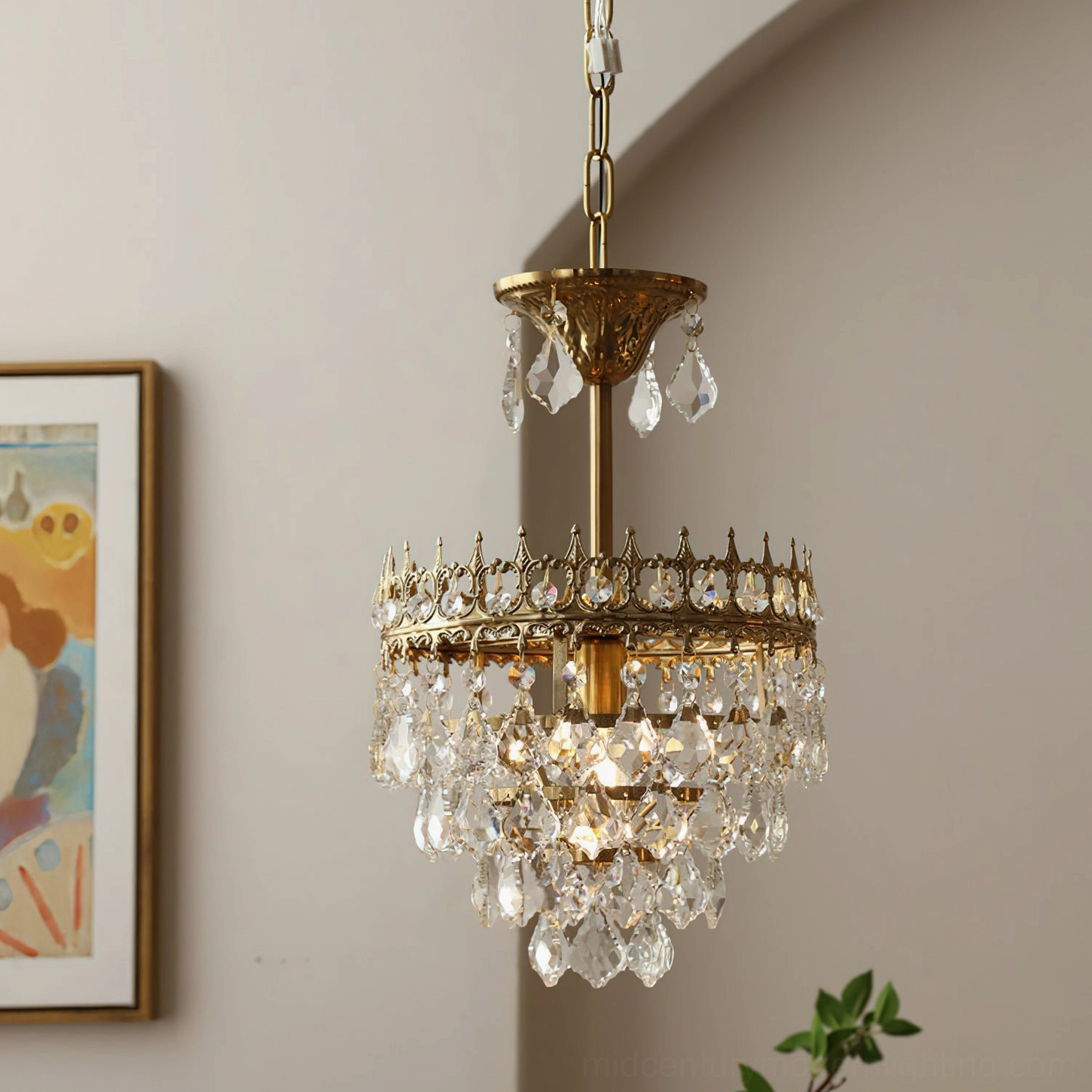 Small Marilyn Crystal Chandelier compact vintage luxury design, low-angle close-up on arched wall with green plant decor