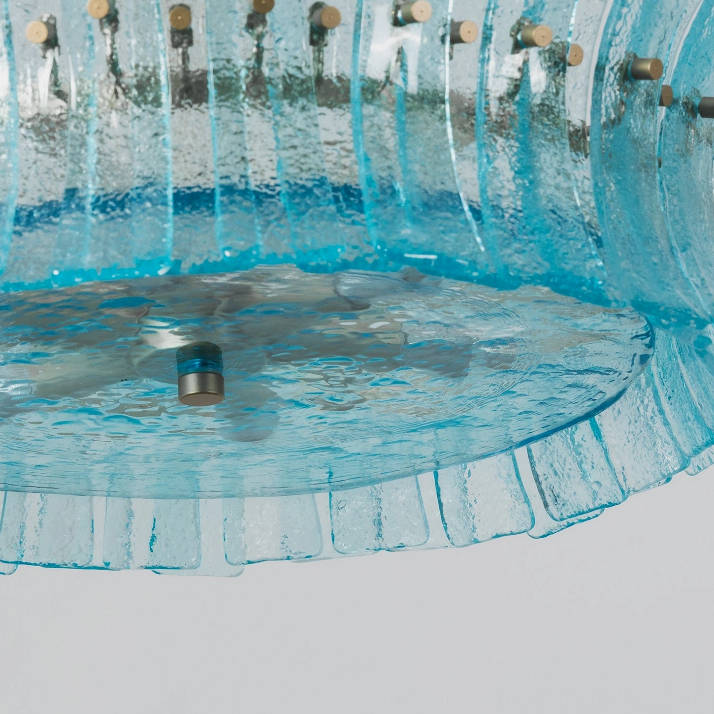 Marin Aquamarine Glass Chandelier paired with mid-century modern furniture styling