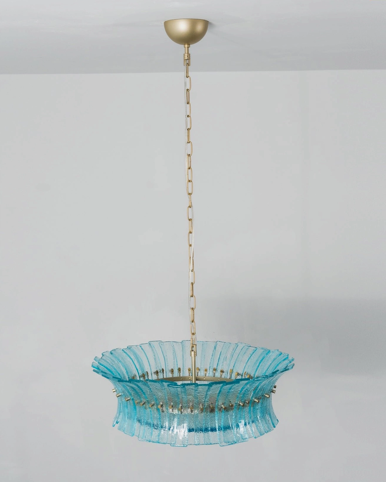 Marin Glass Chandelier installed in modern interior space with ambient lighting demonstration