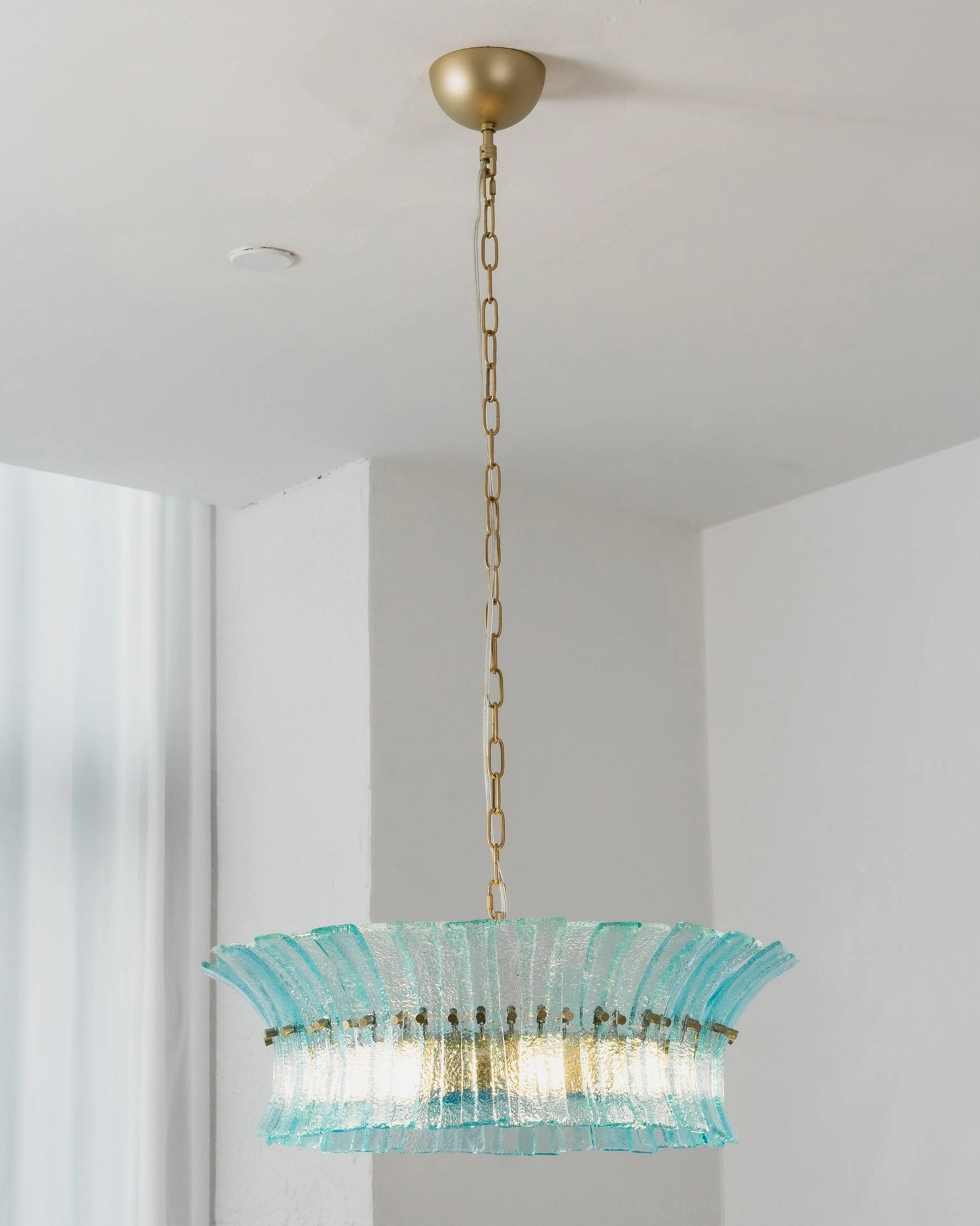 Marin Glass Chandelier close-up of glass plank construction and metal mounting hardware