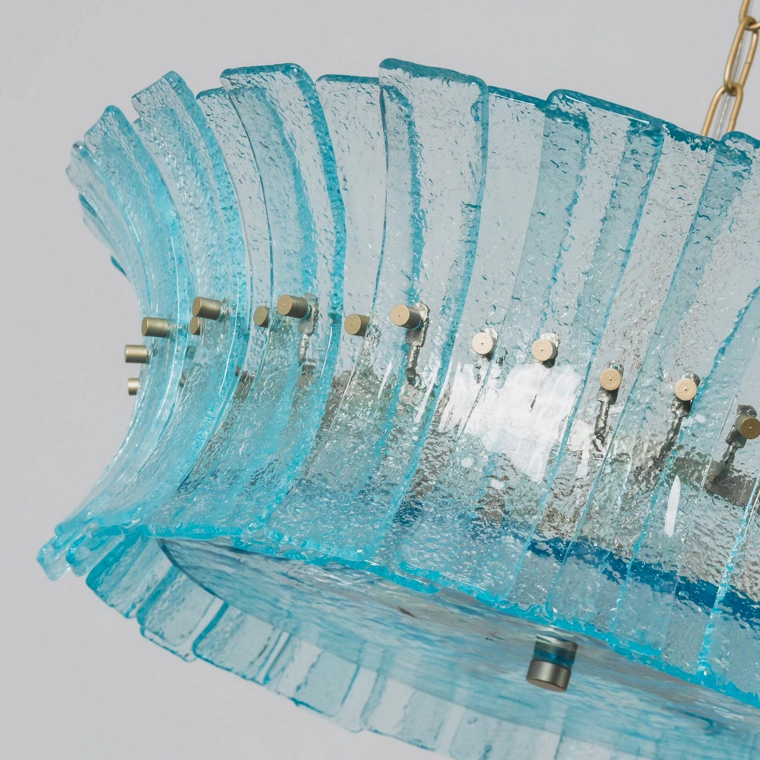 Marin Glass Chandelier showing vertical glass orientation and circular suspension design