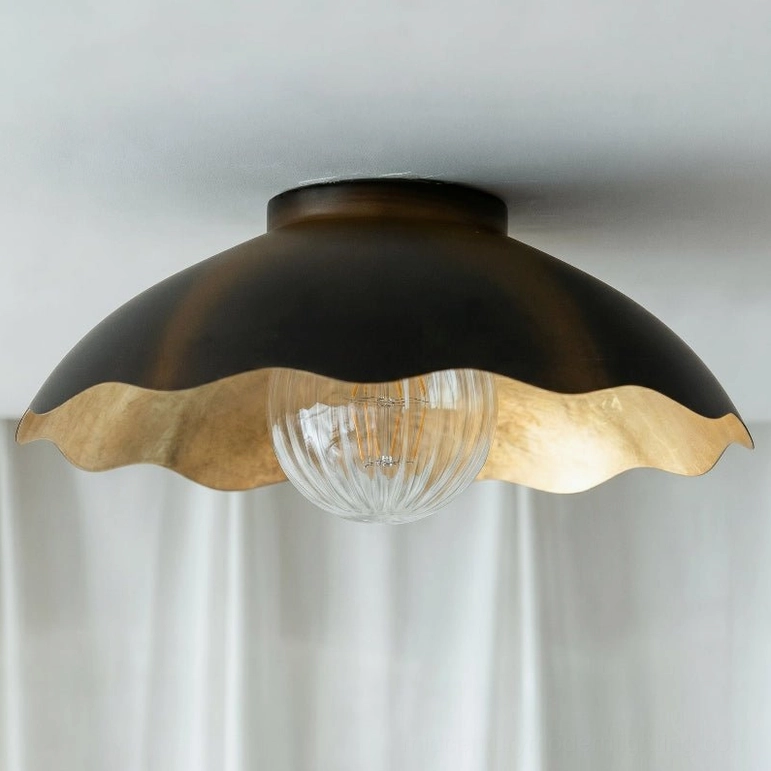 Marlowe scalloped ceiling light black and gold finish - full product lifestyle shot in styled room
