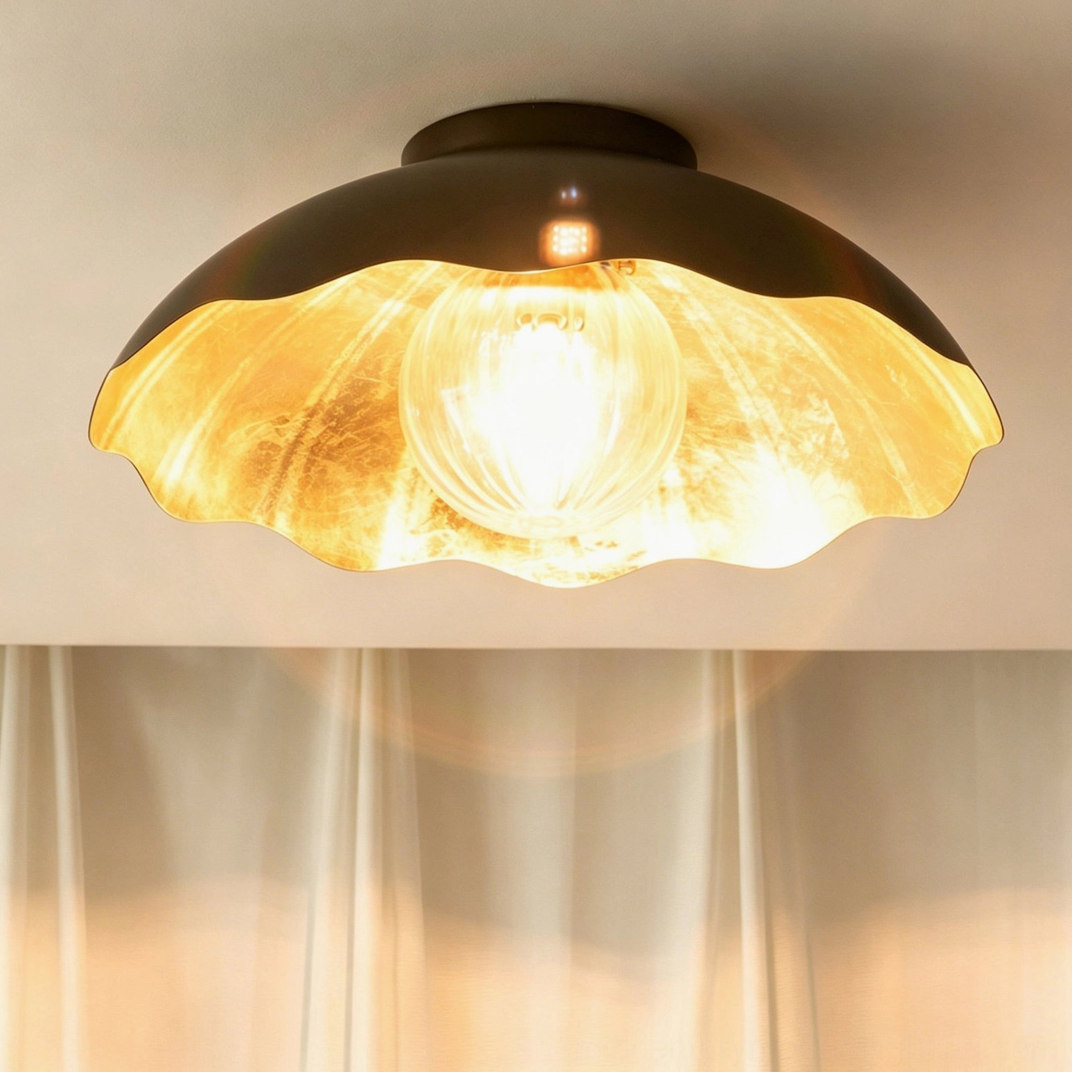 Marlowe ceiling fixture - detail shot emphasizing the organic scalloped edge design and metal craftsmanship