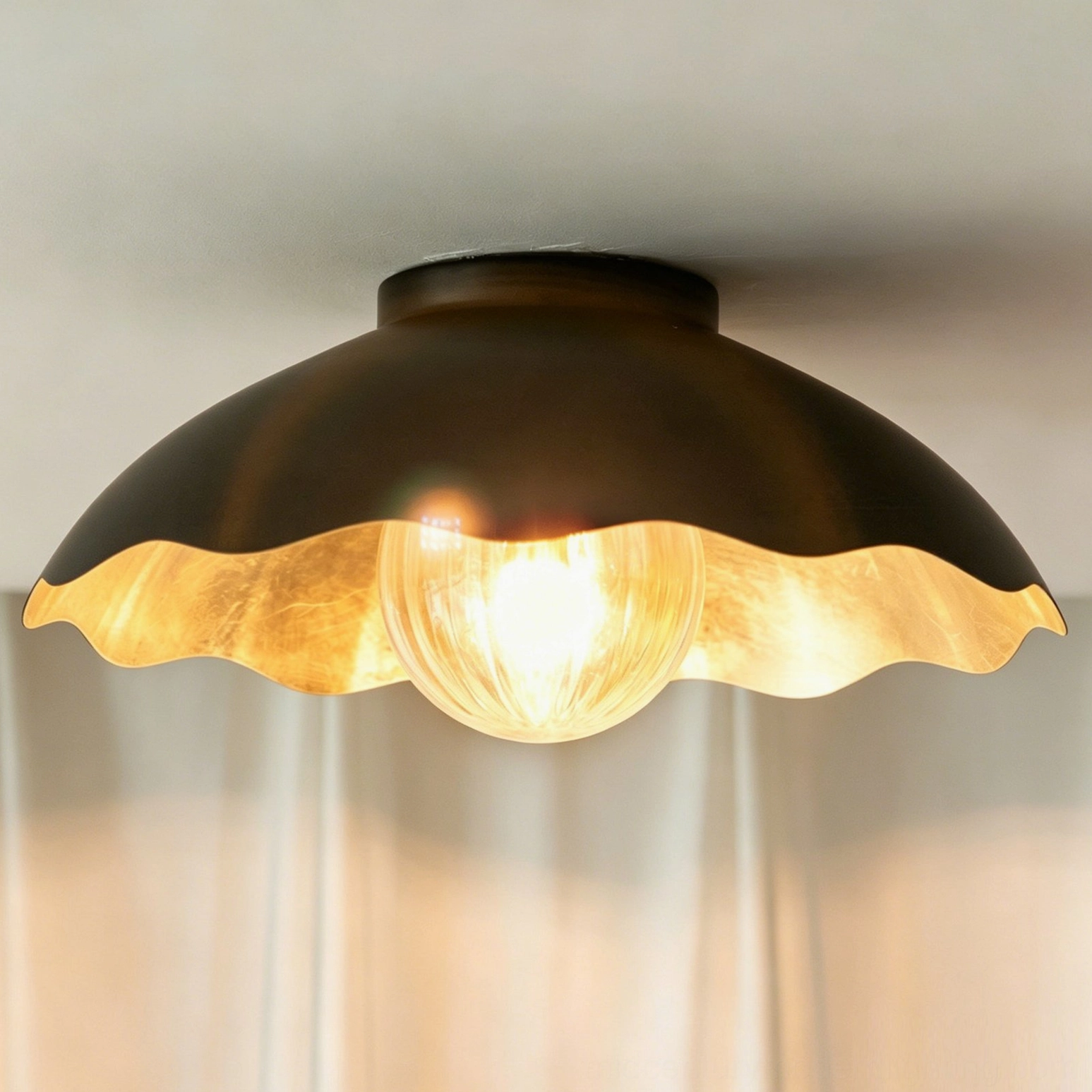 Scalloped flush mount ceiling light - installed view in home interior showing design integration