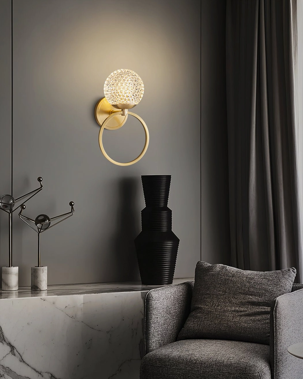 Marni Modern Wall Light mounted on wall demonstrating mid-century contemporary style with brushed brass and crystal elements