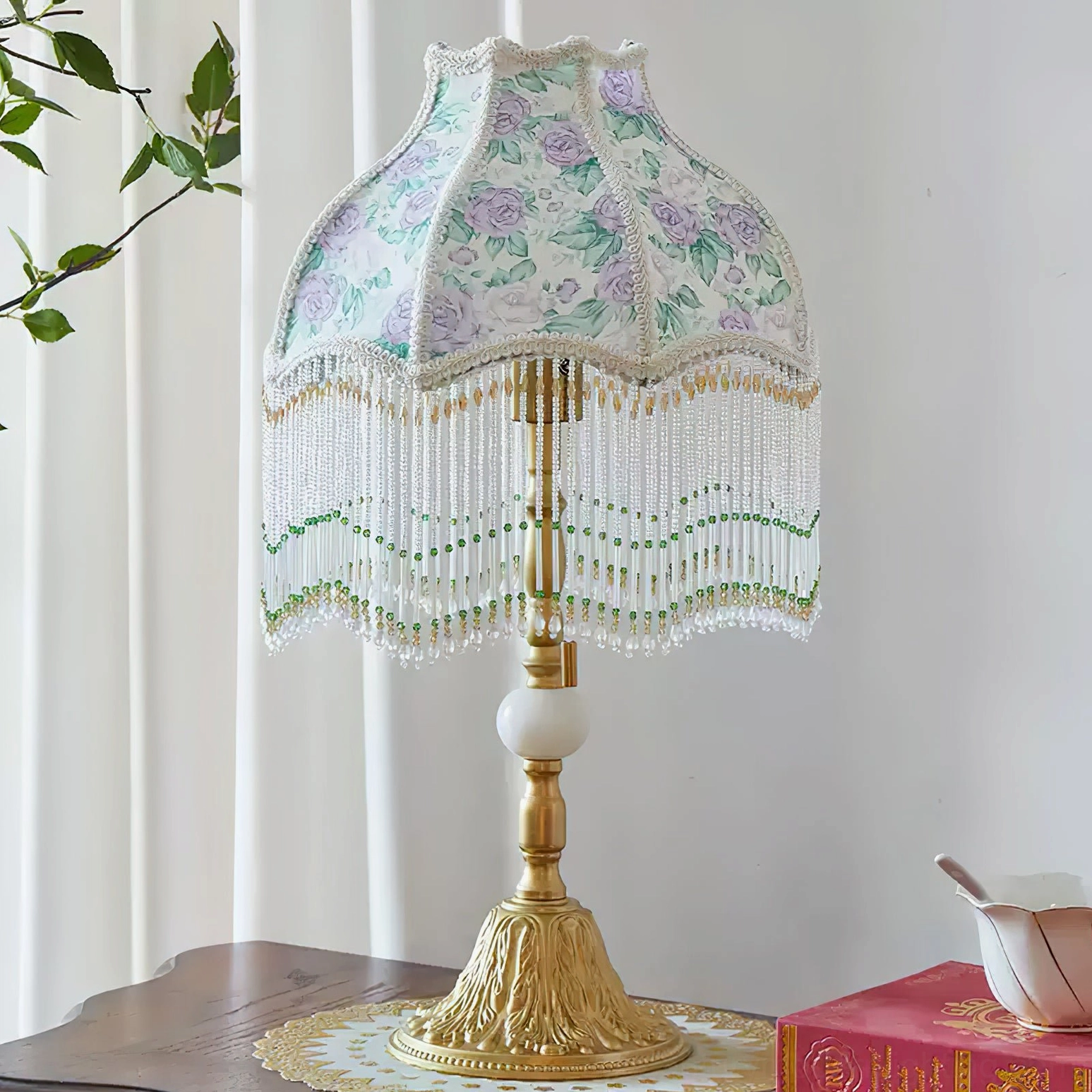 Masa vintage Tiffany style table lamp three-quarter angle showing white decorative pole accent and green beaded trim on bedroom side table
