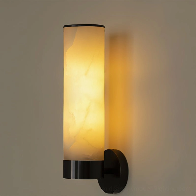 Black accent alabaster wall sconce with matte finish mounting and glowing warm illuminated stone, side angle view