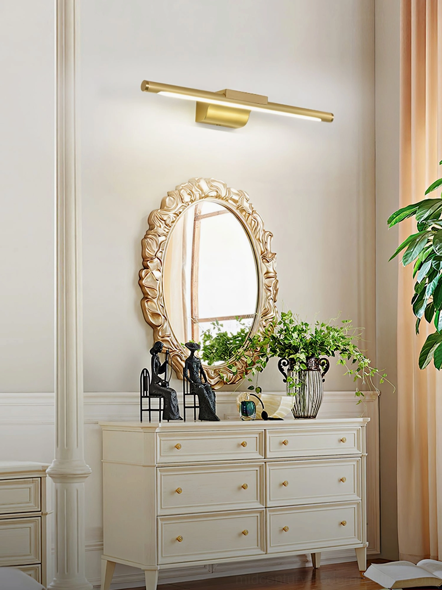 Bathroom wall sconce with matte brass finish and minimalist aesthetic