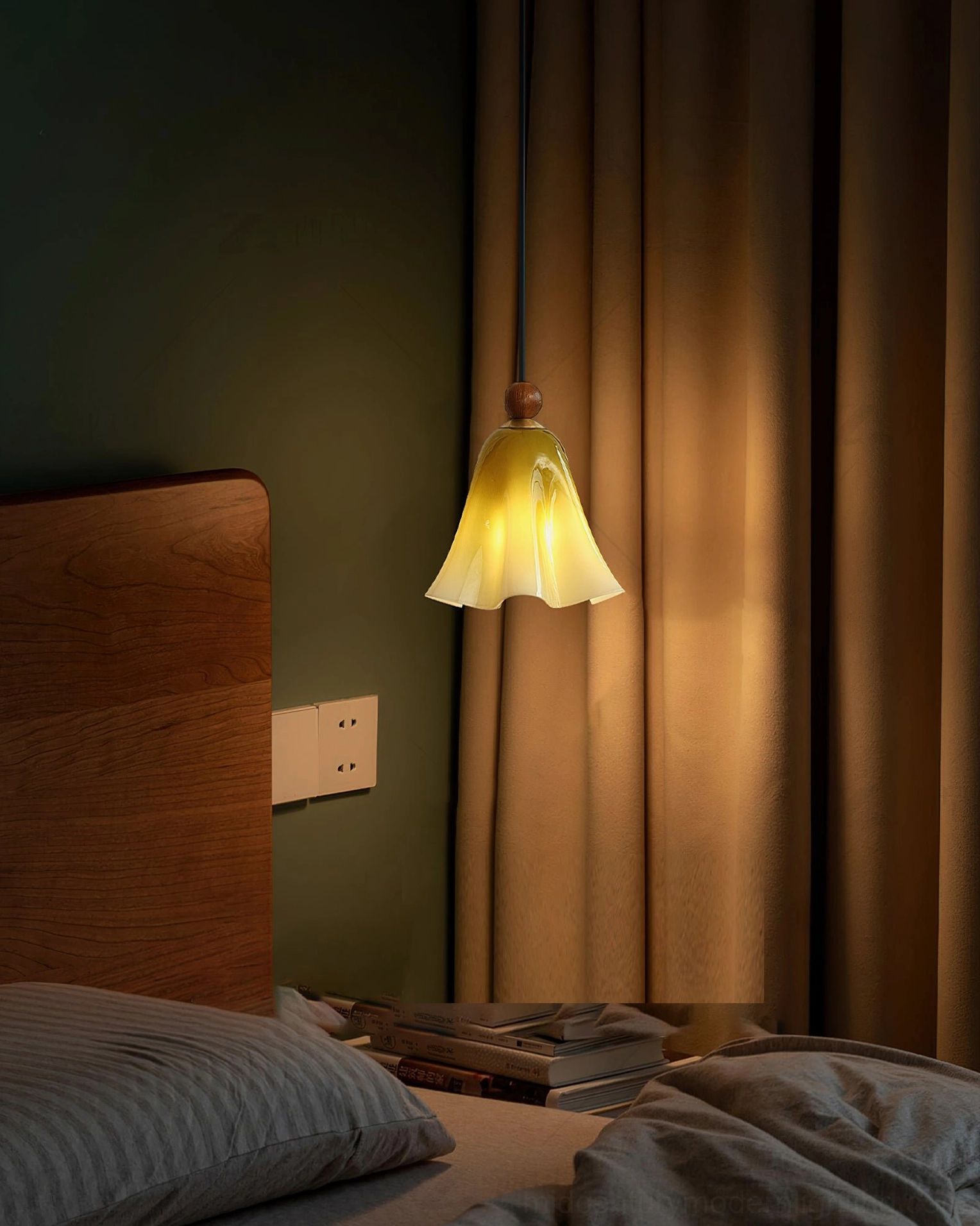 Meblo green gradient ruffled pendant light side angle in bedroom with dark green walls and wooden headboard