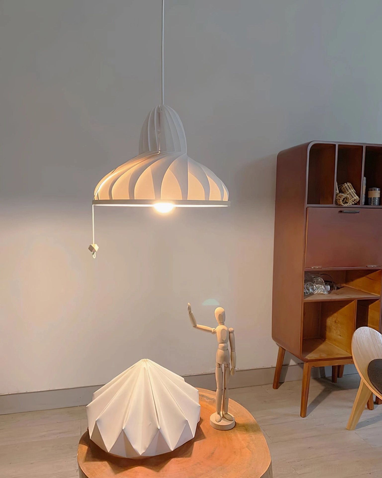 Meblo pendant lamp detail showing ribbed fabric shade construction and finish