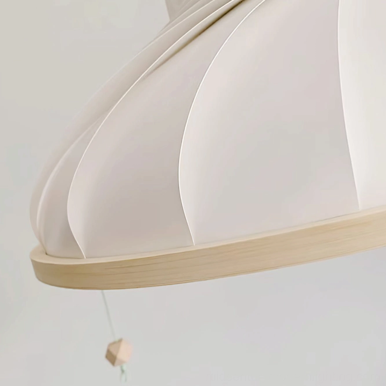 Close-up detail of Meblo pendant lamp ribbed off-white shade and smooth wood rim