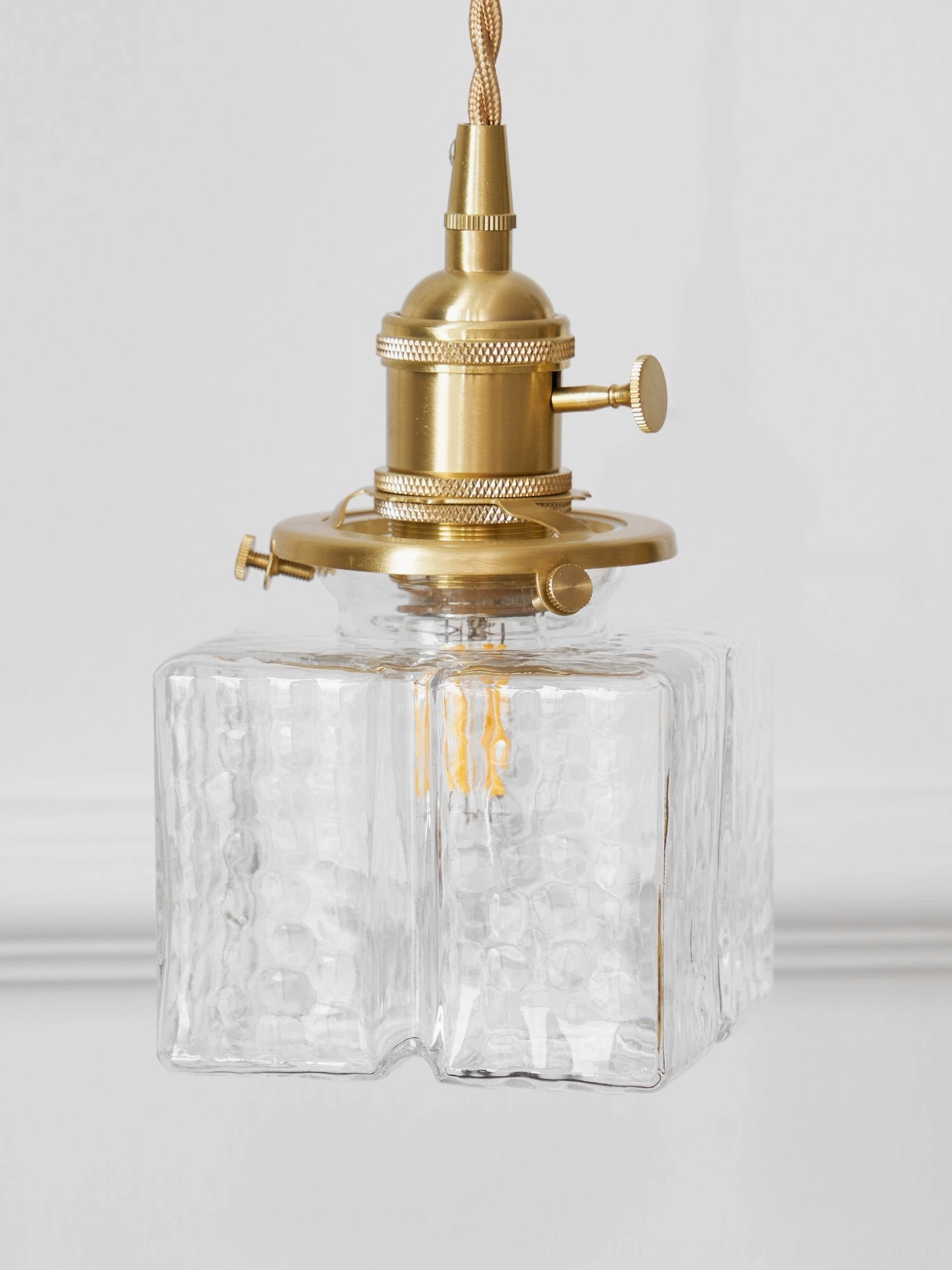 Mid-century brass glass wall lamp with textured shade gallery wall accent piece