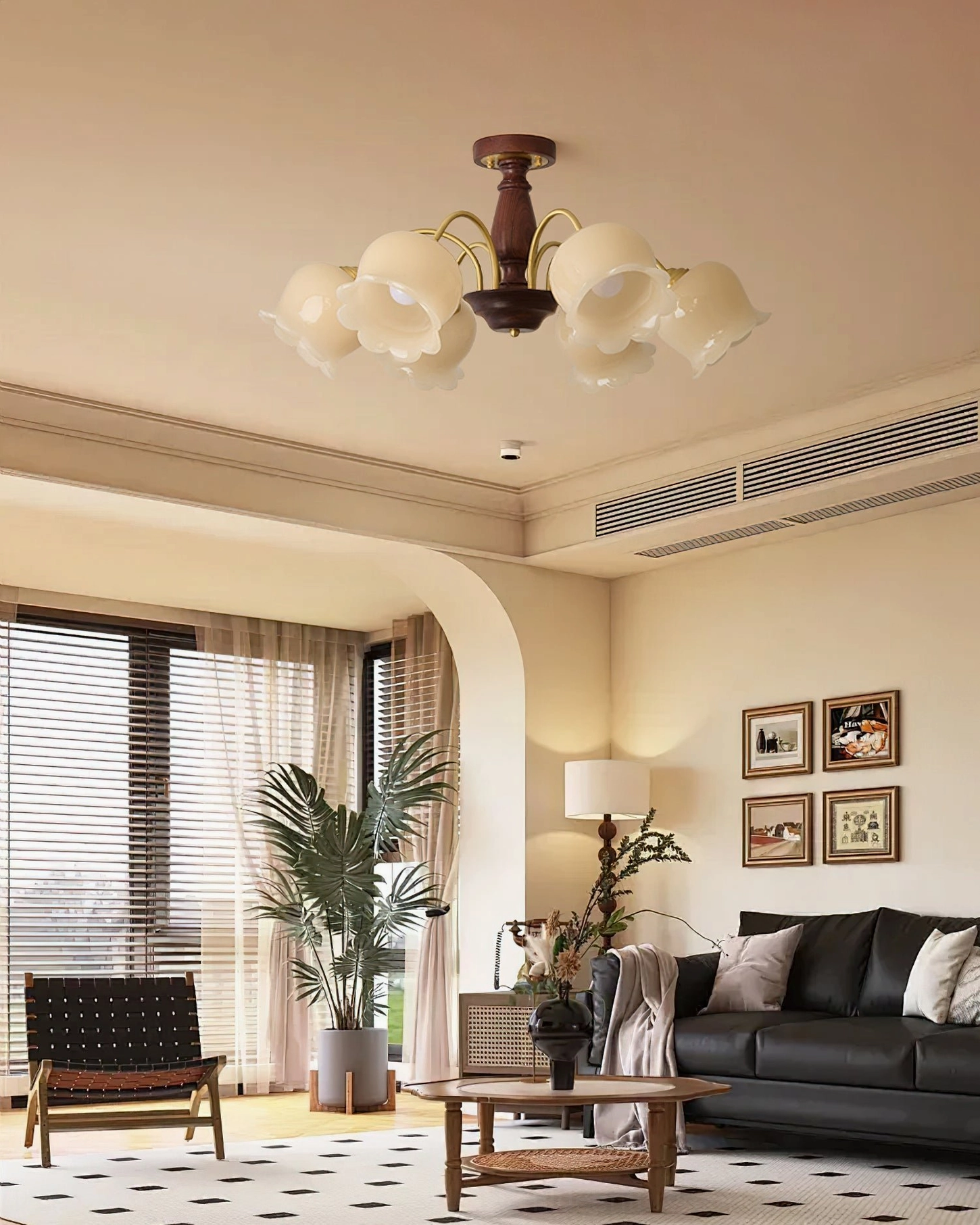Mid-century modern flower chandelier in contemporary living room, brass botanical lighting fixture with cream glass elements