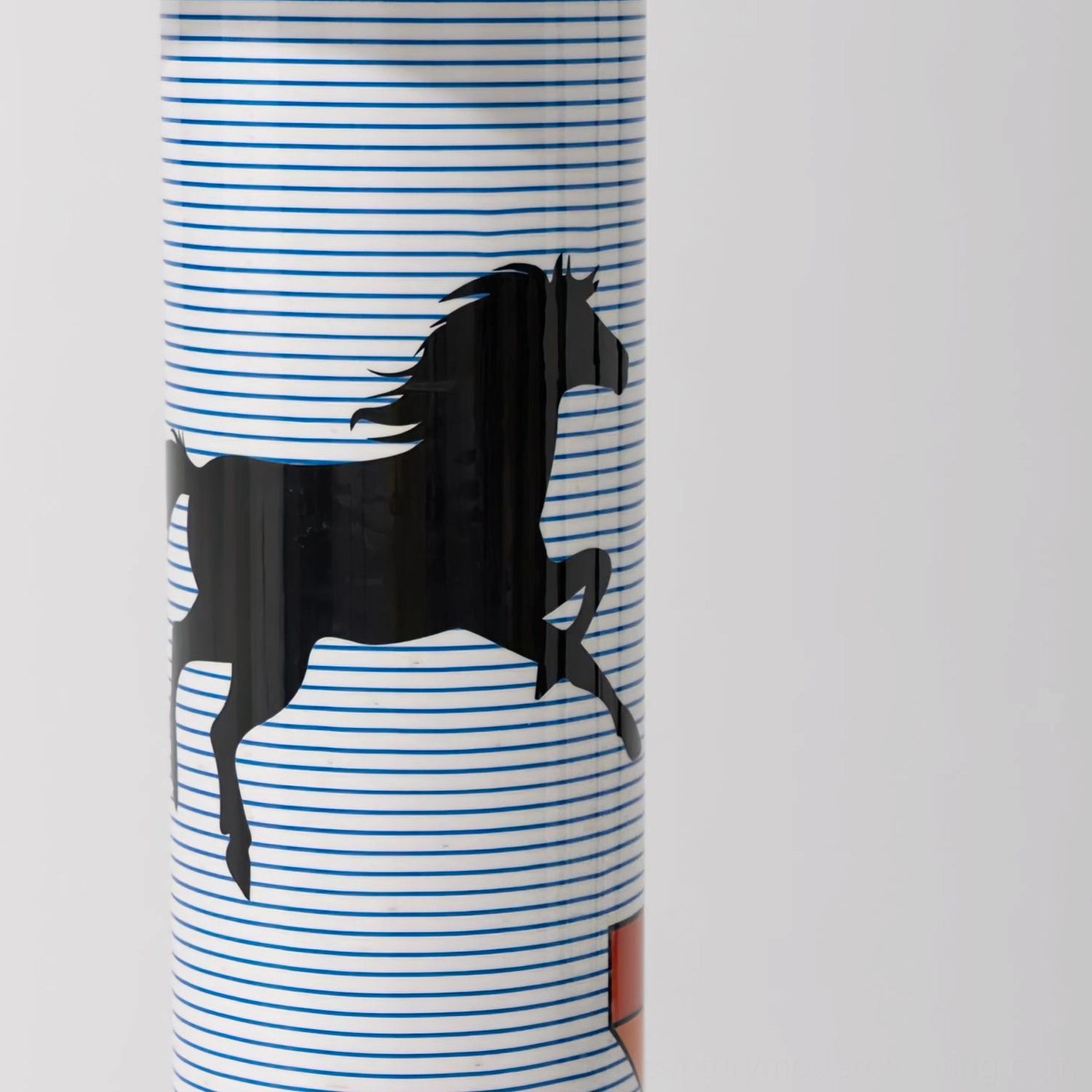 Mid-century modern inspired floor lamp with blue and orange striped linen shade and artistic pony print detail