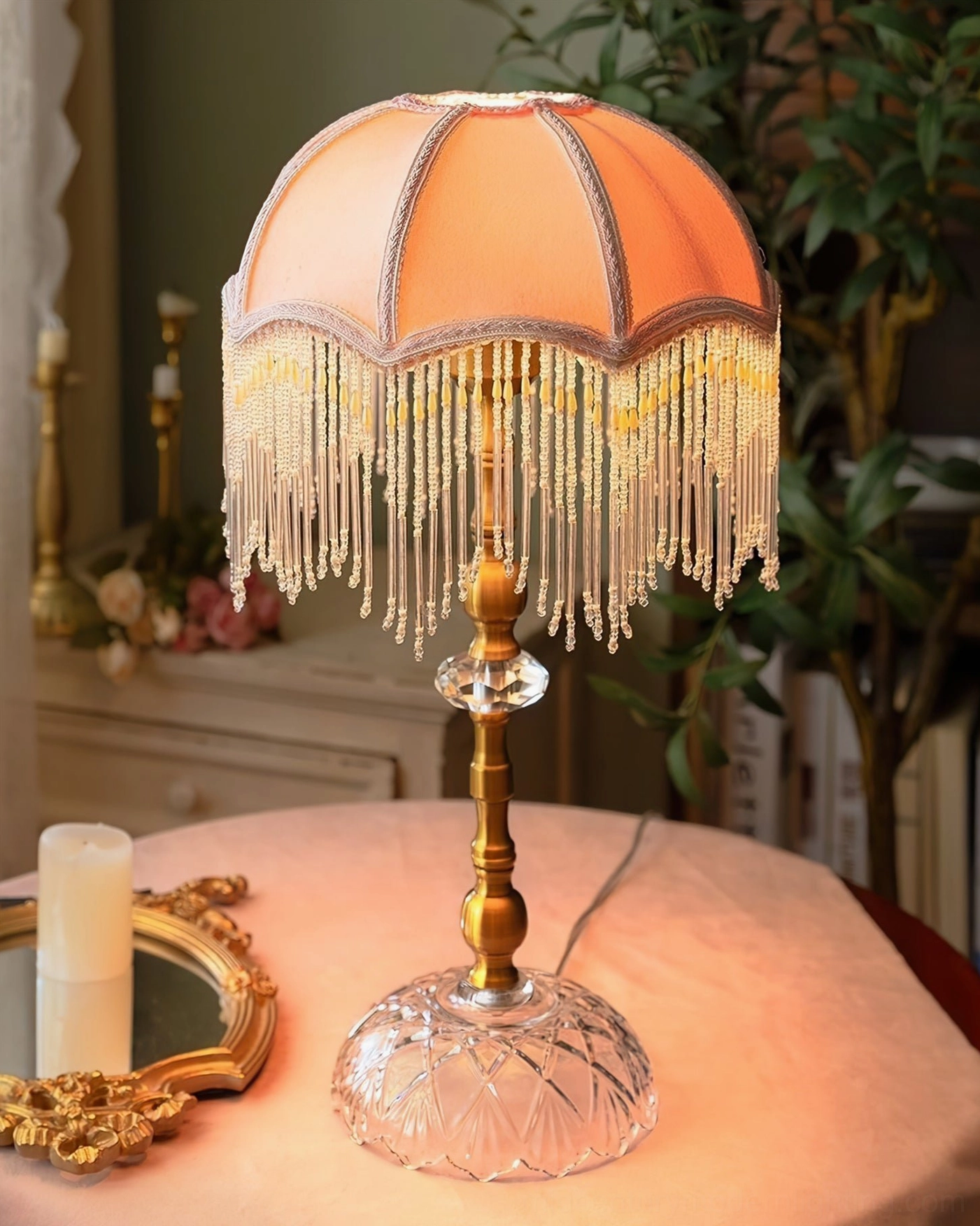Mid-century modern table lamp with jewel-tone velvet shade and antique brass base