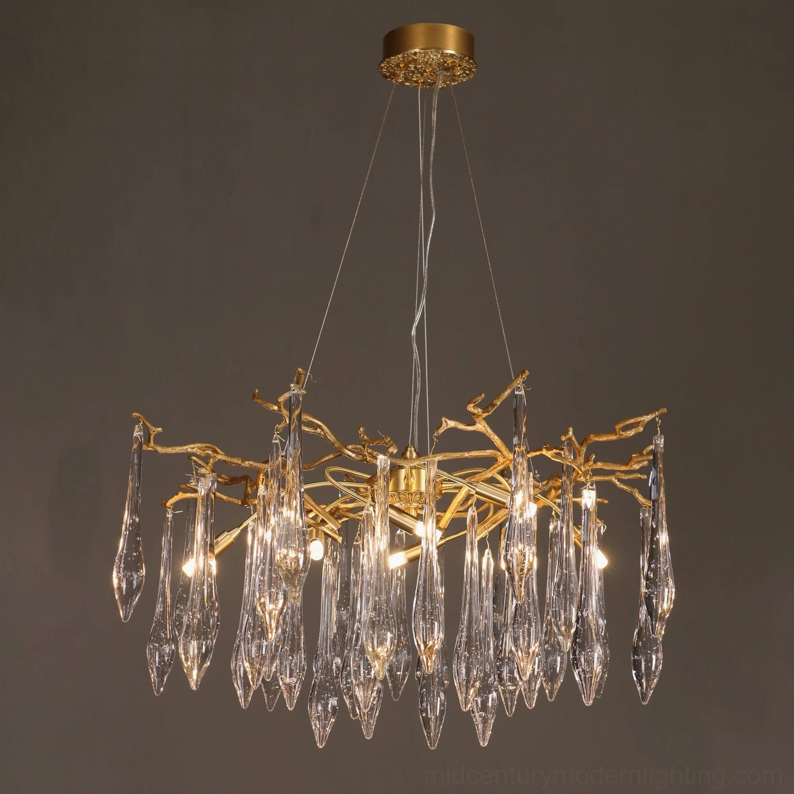 Mid-century modern brass chandelier full product shot showing sculptural branch design