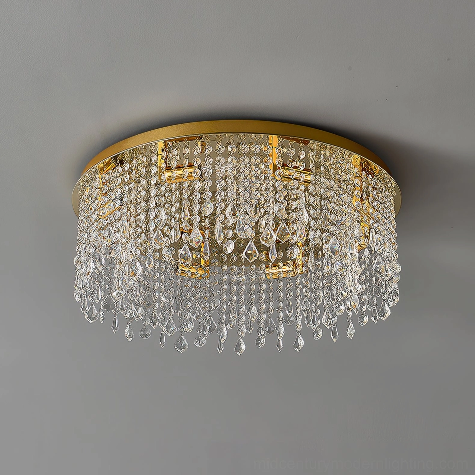 Three-quarter angle view of modern crystal ceiling lamp highlighting dual-layer crystal strands and polished gold rim