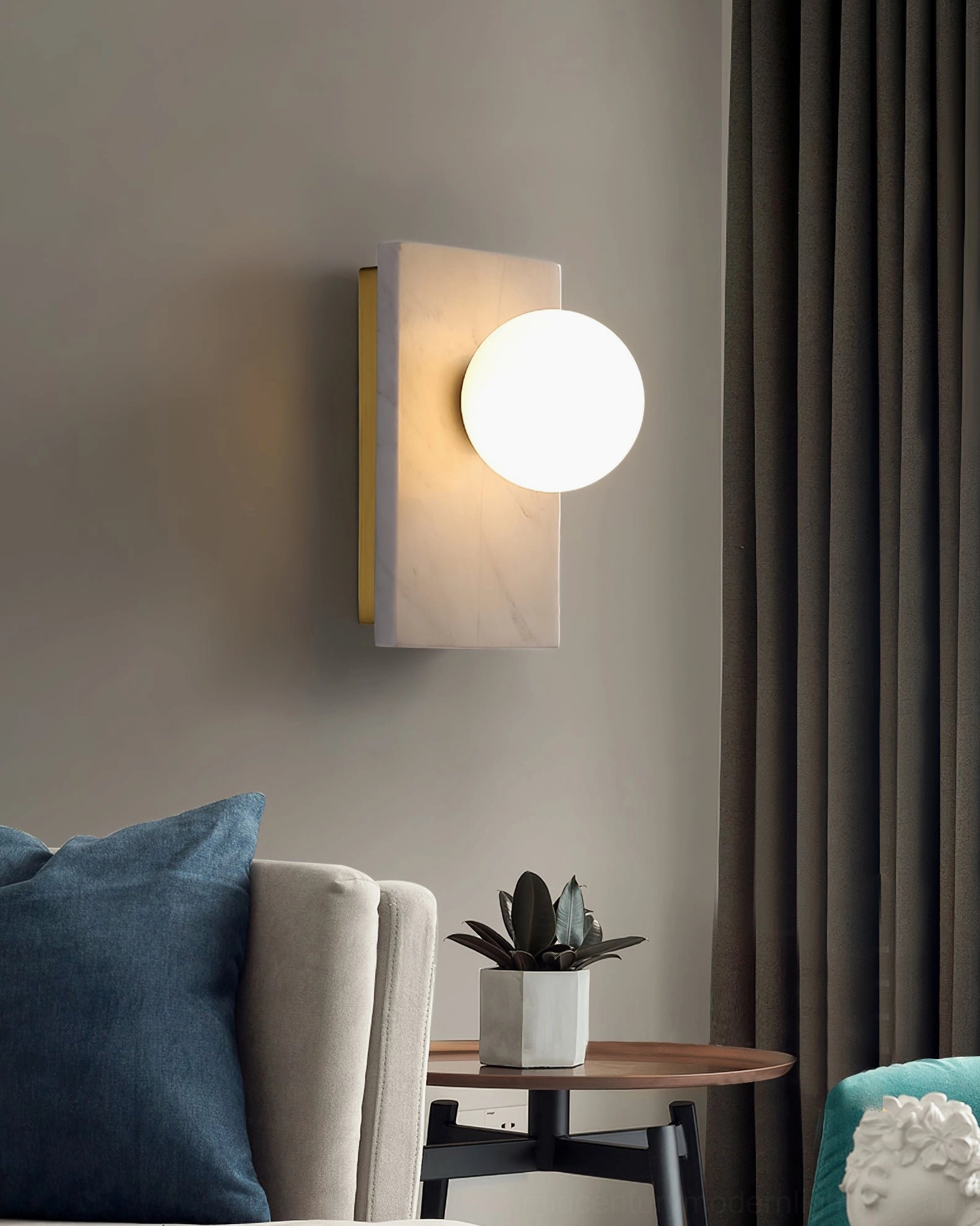 Mid-century modern marble wall sconce displaying sculptural design and frosted glass diffuser profile