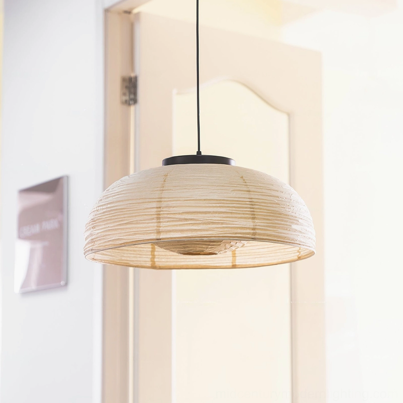 Mid-century modern paper dome pendant light – side angle view showing structure and black canopy