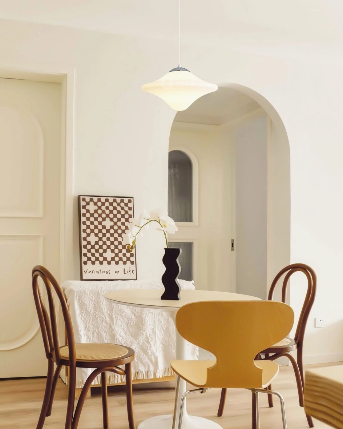 Mid-century modern pendant lamp in contemporary home interior setting with refined aesthetic