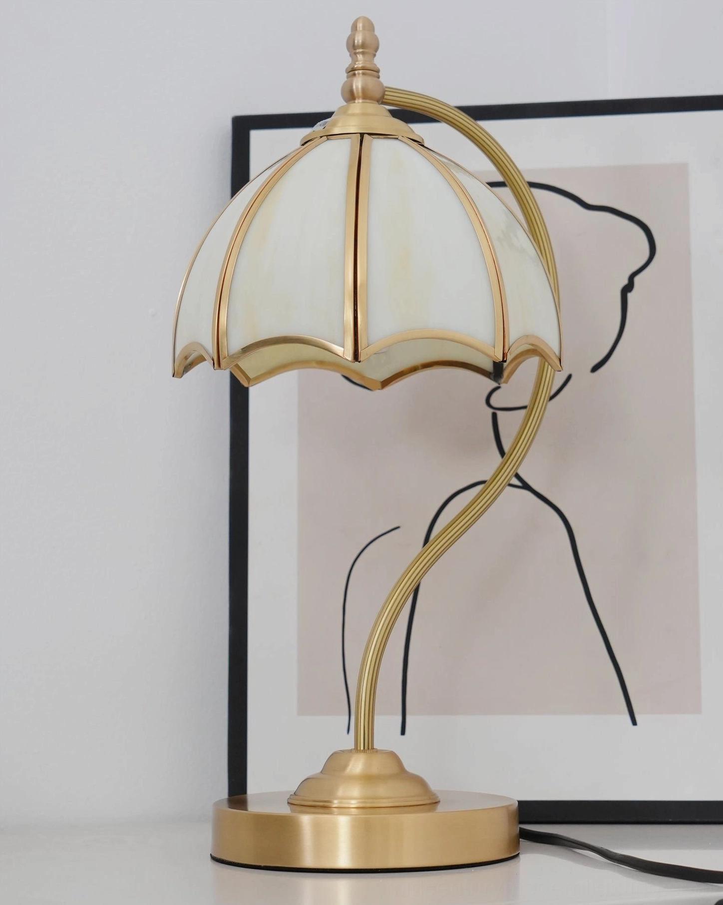 Mid-century modern umbrella lamp in elegant home decor styling with brass accents