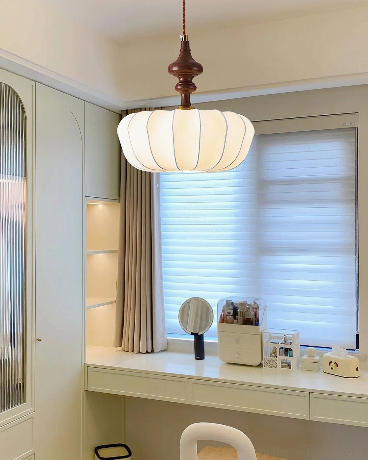 Warm cream ribbed pendant light illuminating home office desk with cottagecore aesthetic
