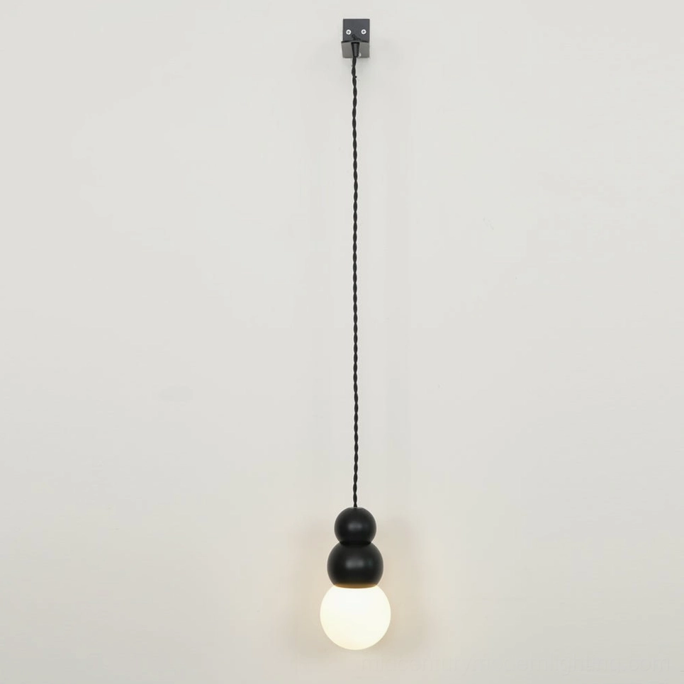 Mid-century spherical wall sconce, timeless pendant design, classic modern lighting form