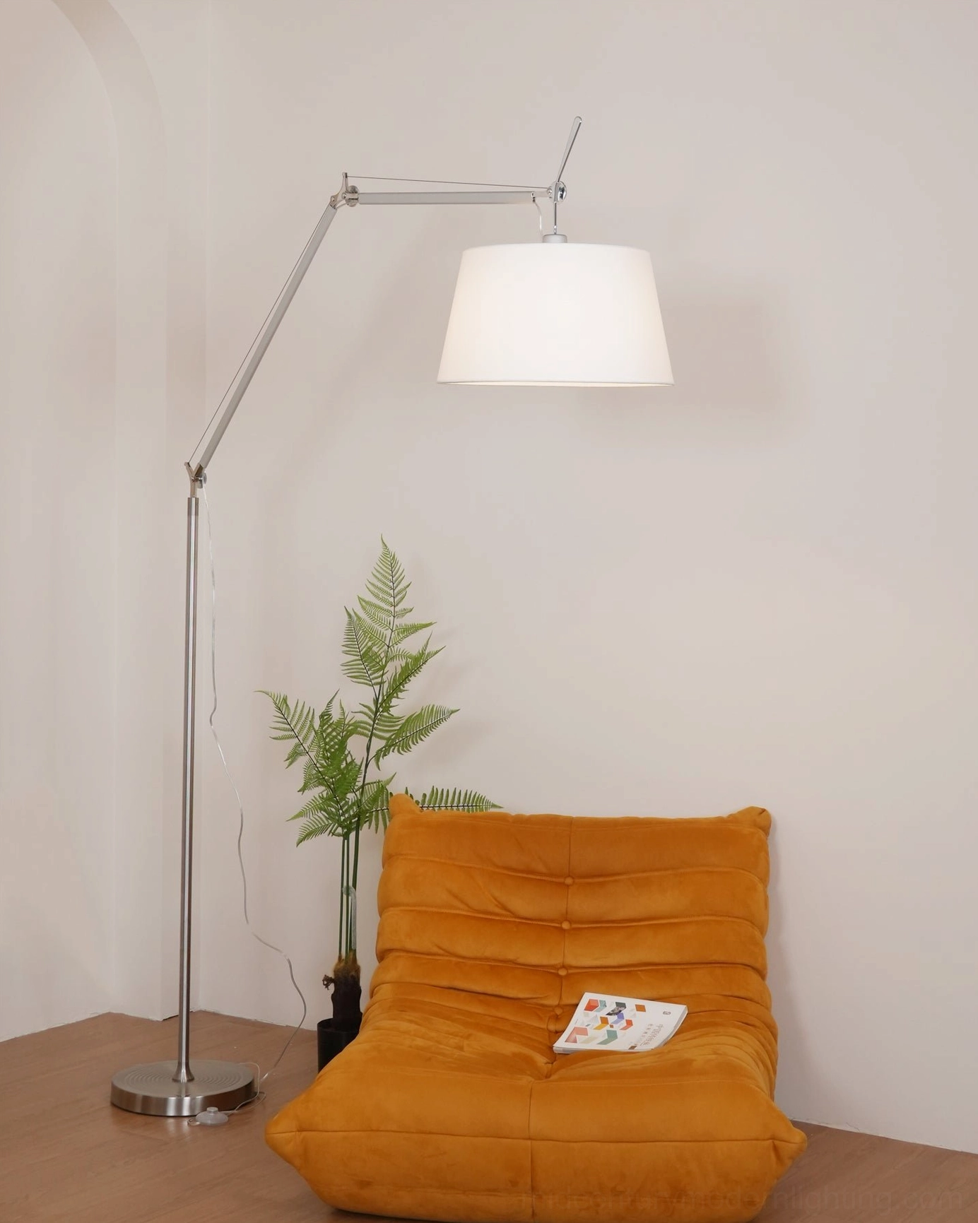 Mid-century modern swing arm floor lamp detail view, adjustable jointed metal frame with precision engineering