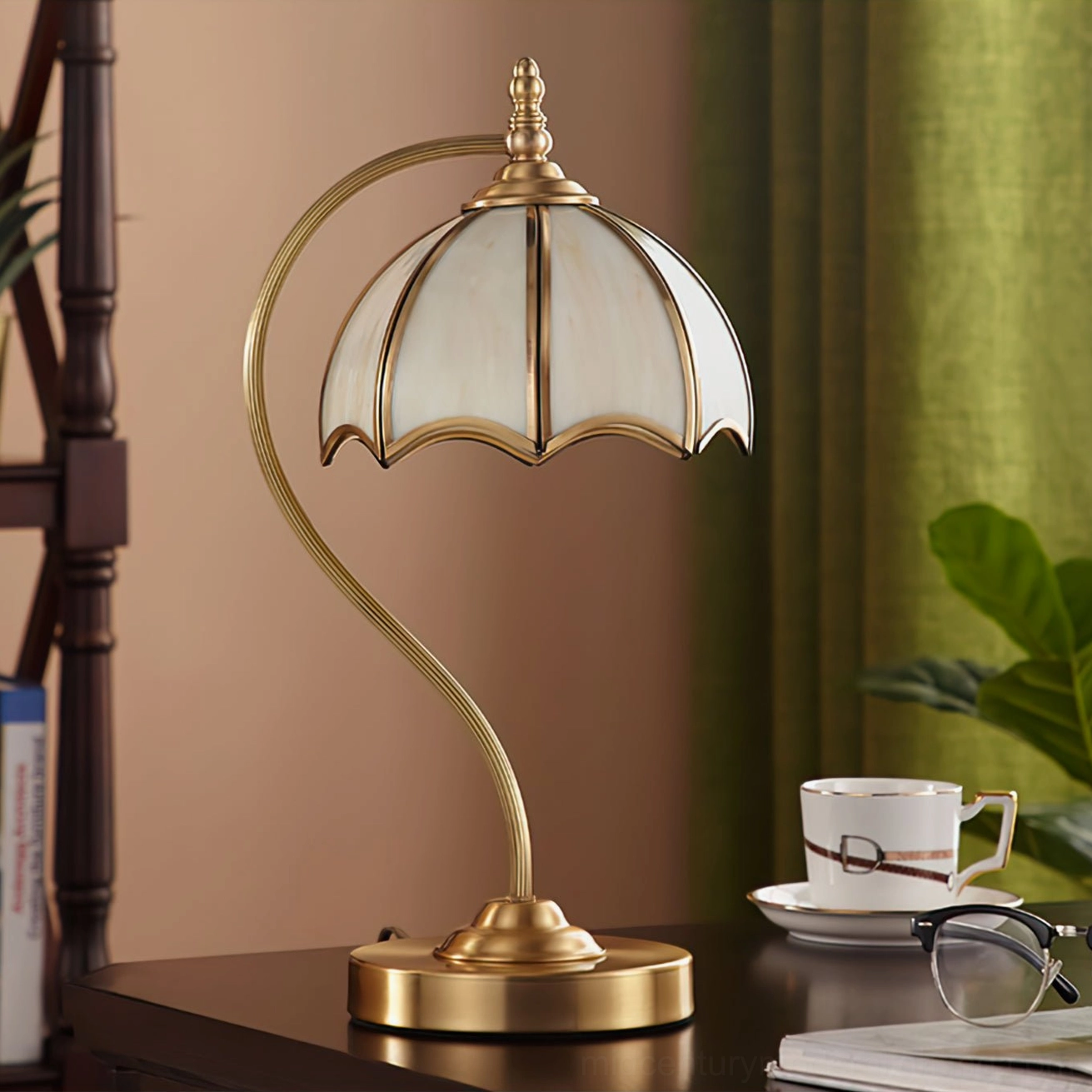 Mid-century modern umbrella lamp three-quarter angle showing curved brass pole and glass panel shade
