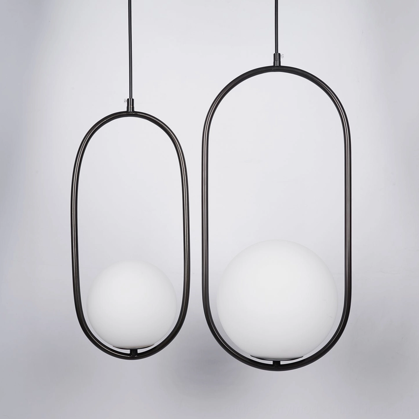 Mila black pendant light oval frame design with diffused warm glass shade - Nordic modern lighting fixture