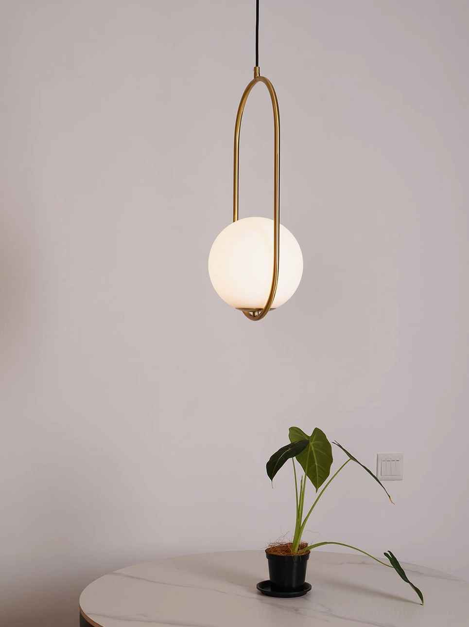 Mila brass geometric pendant light with metal frame and frosted glass sphere - warm vintage modern design
