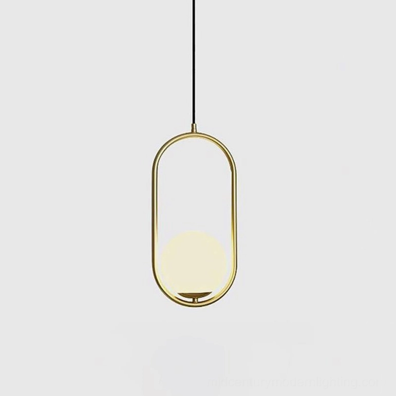 Mila hanging pendant light detailed view of frosted white glass sphere quality and metal frame precision craftsmanship