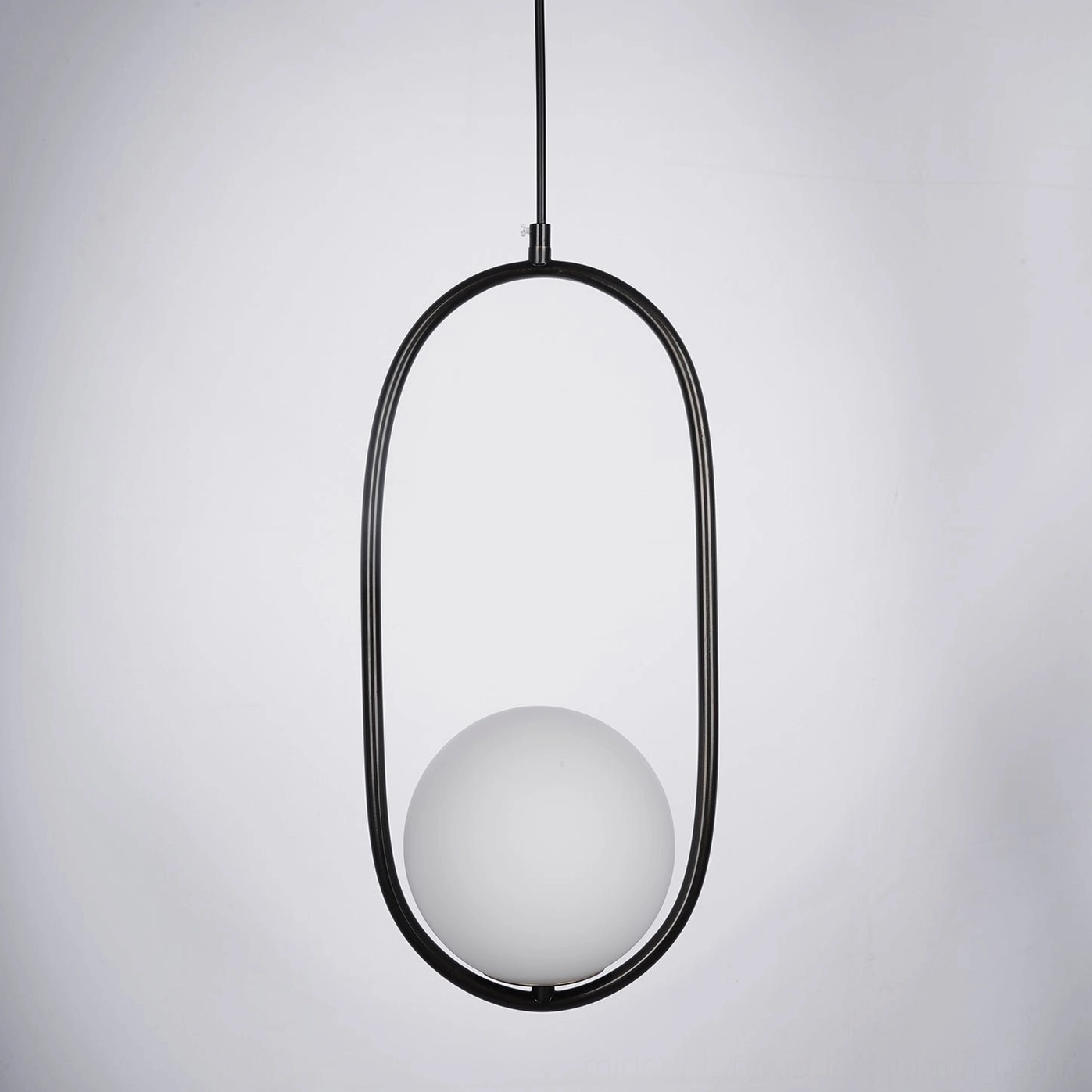 Mila pendant light multiple installation view showing versatile sizing options in coordinated interior design scheme