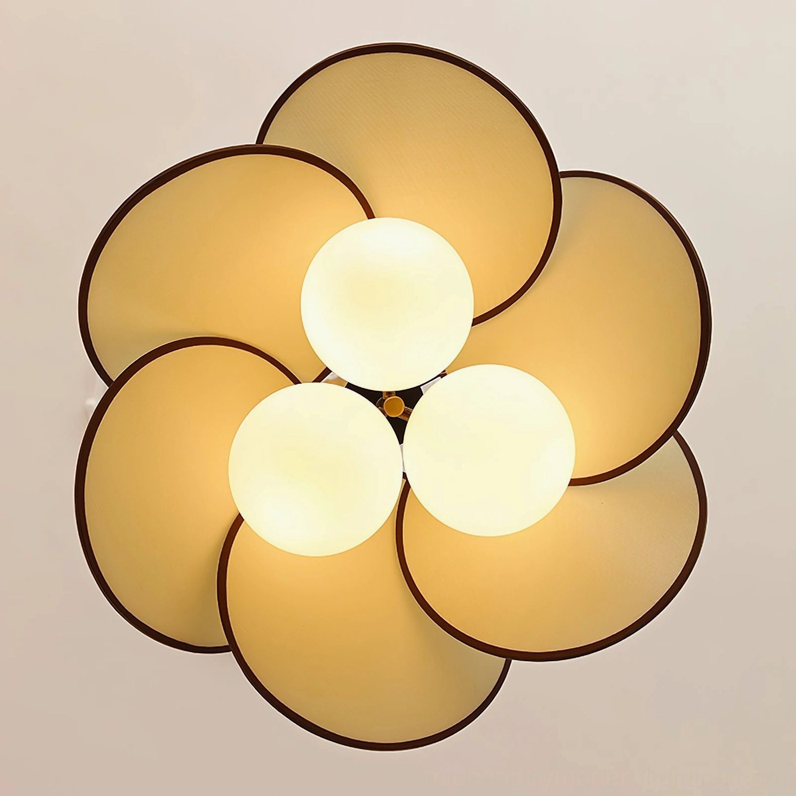 Close-up detail view of Miley pendant light showing three frosted glass globes and fabric petal construction
