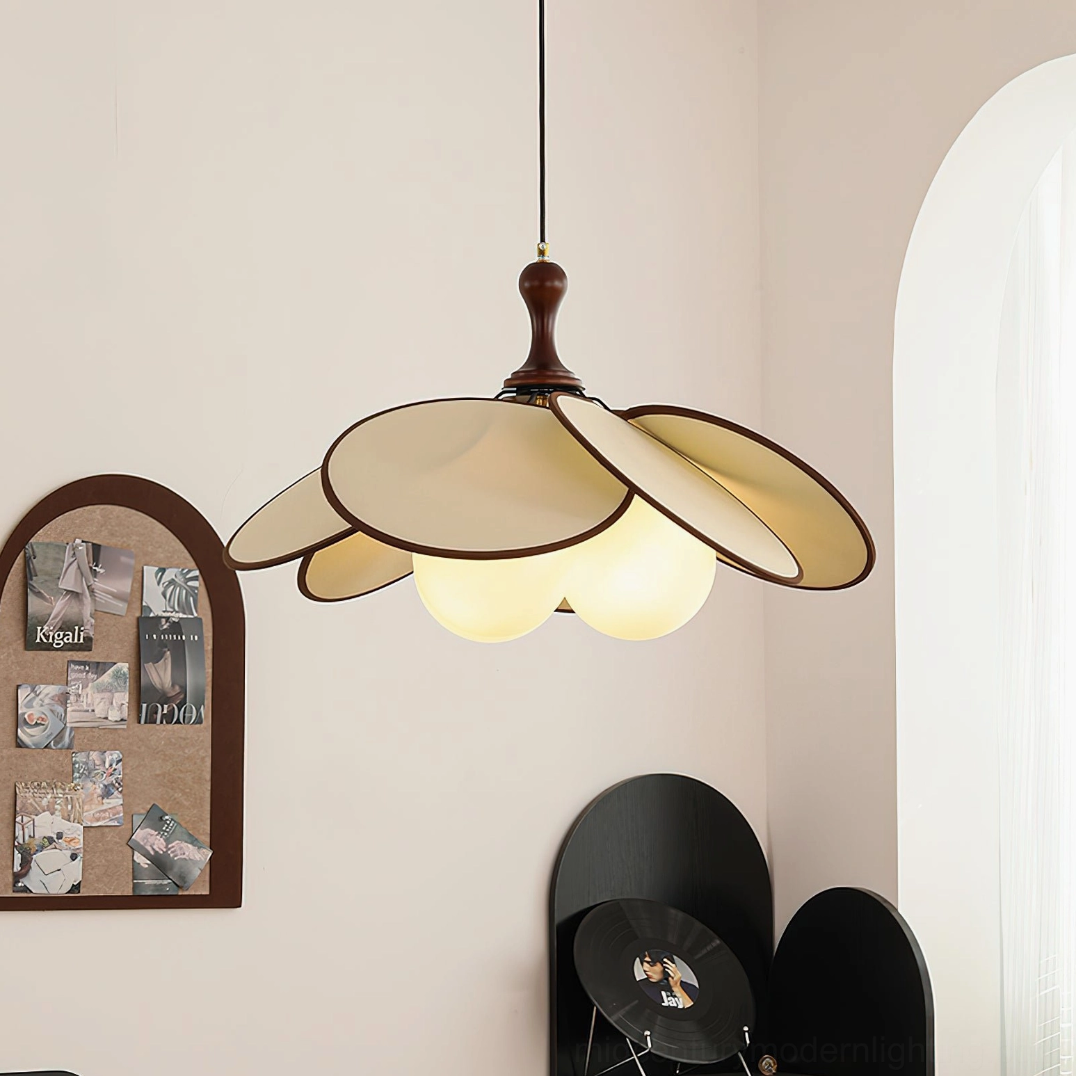 Miley floral pendant light glowing in French-style room with arched wall décor