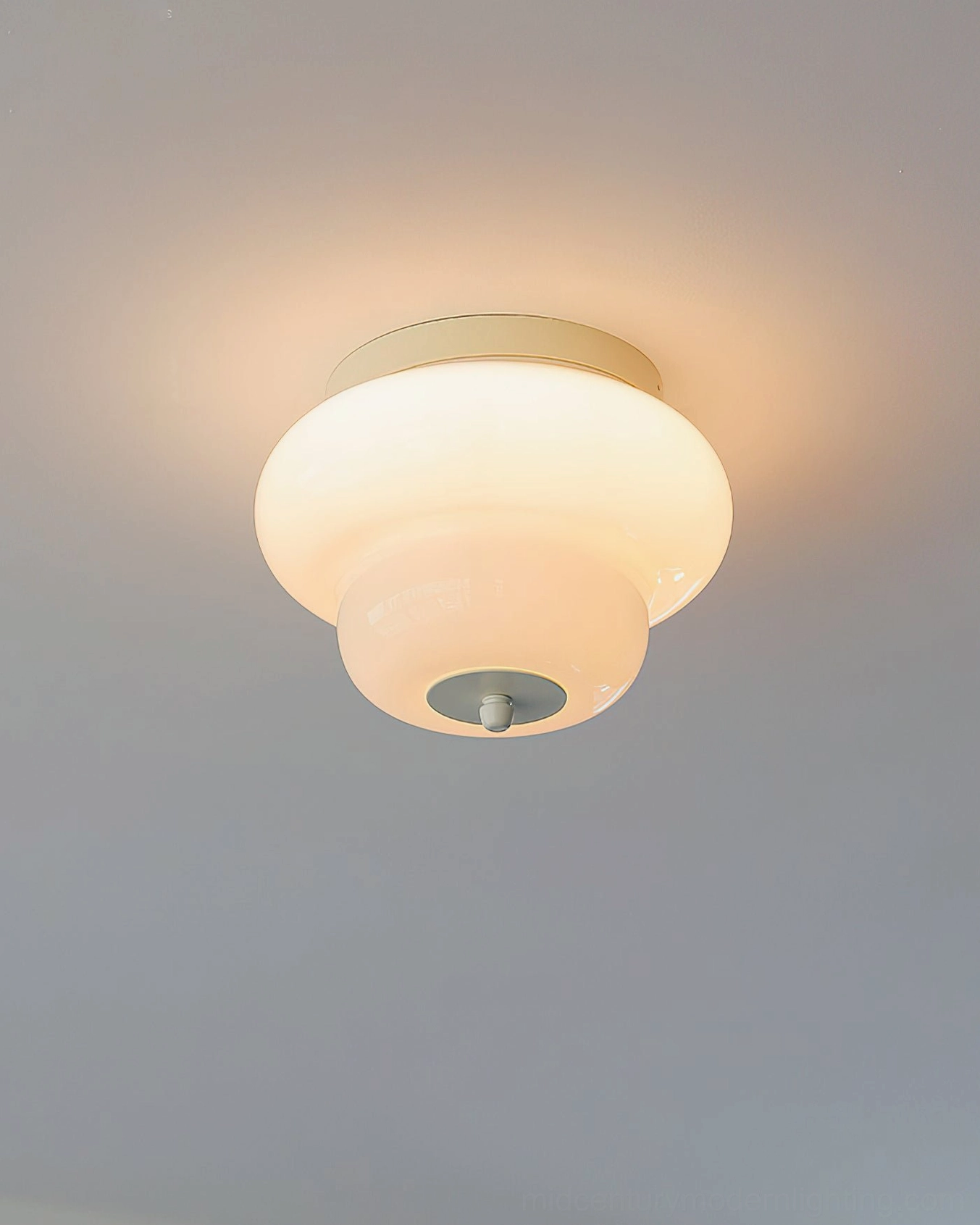 Milo mid-century schoolhouse flush mount ceiling light showing sculptural glass form and compact depth profile