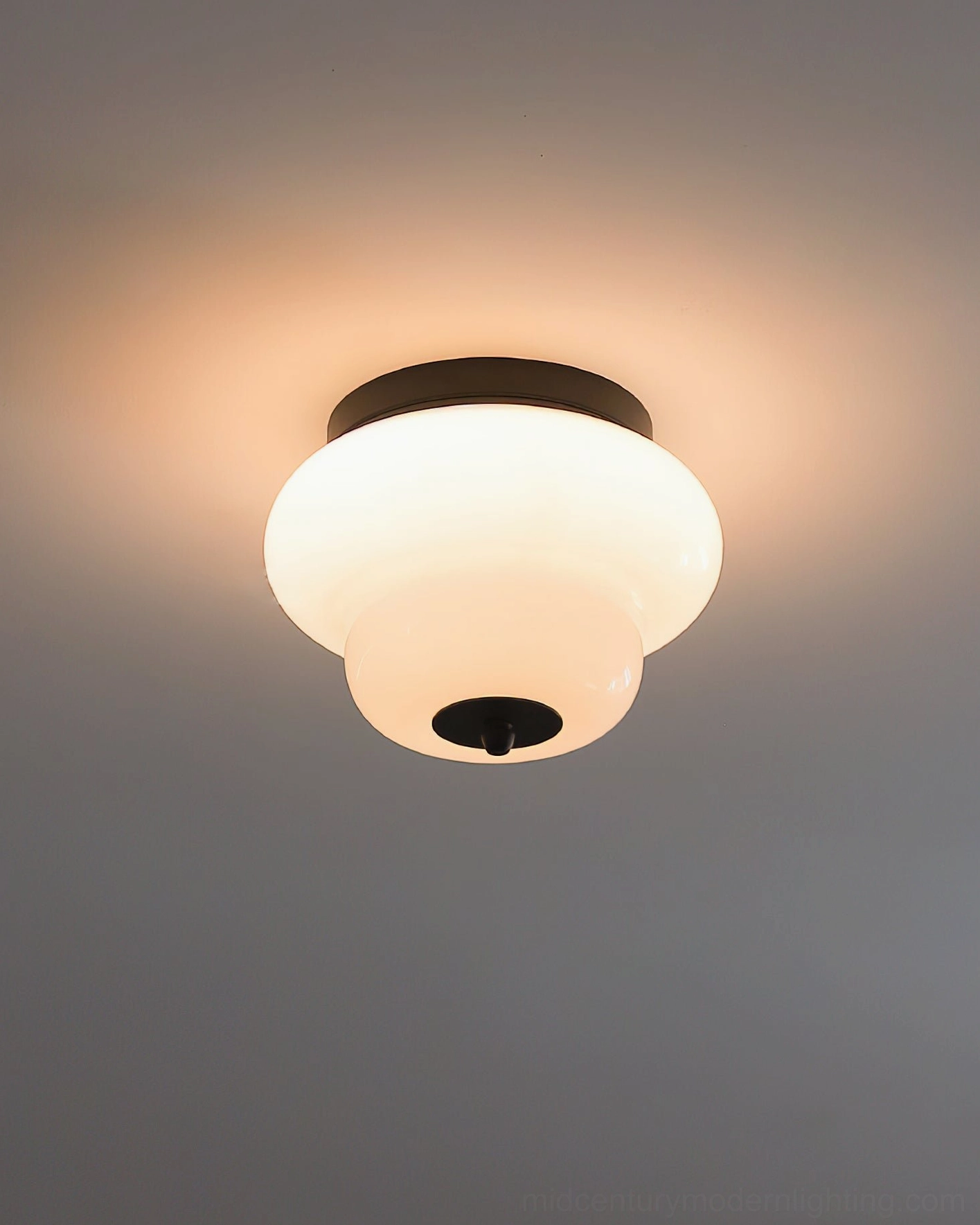 Milo ceiling mount light in white finish integrated into clean minimal Scandinavian-style interior ceiling
