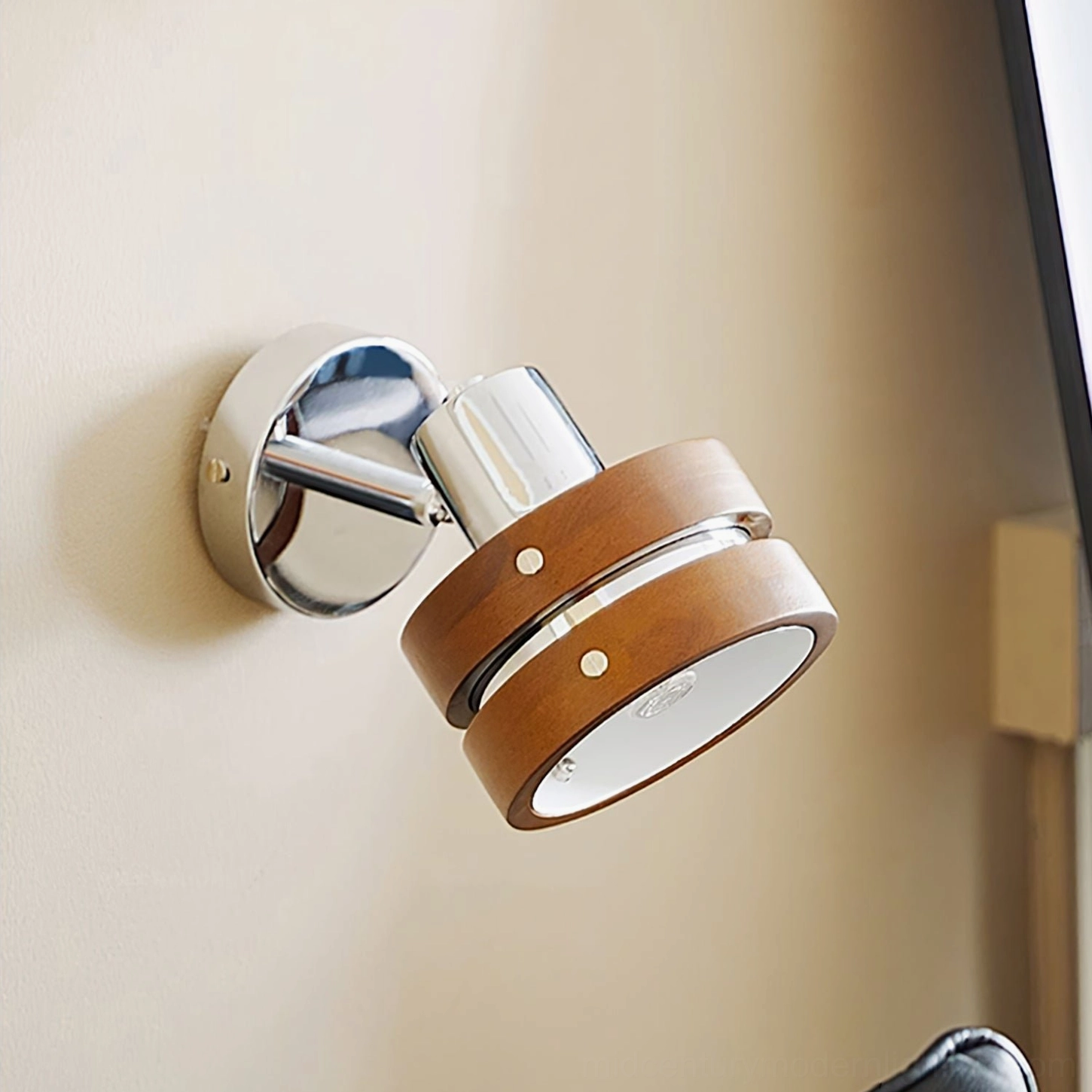 Minimalist Nordic wall sconce with chrome and wood in contemporary interior