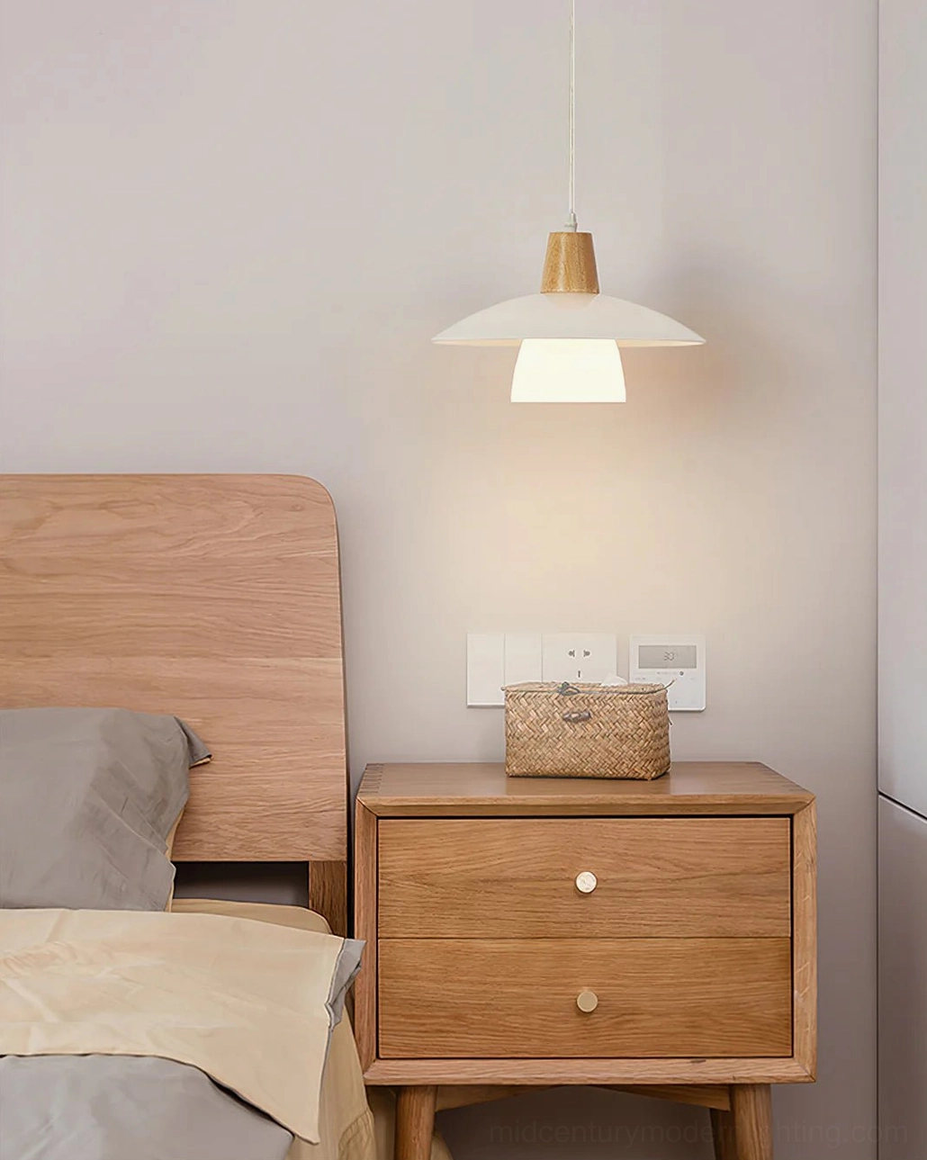 Compact minimalist pendant light by bedroom bedside in japandi style interior