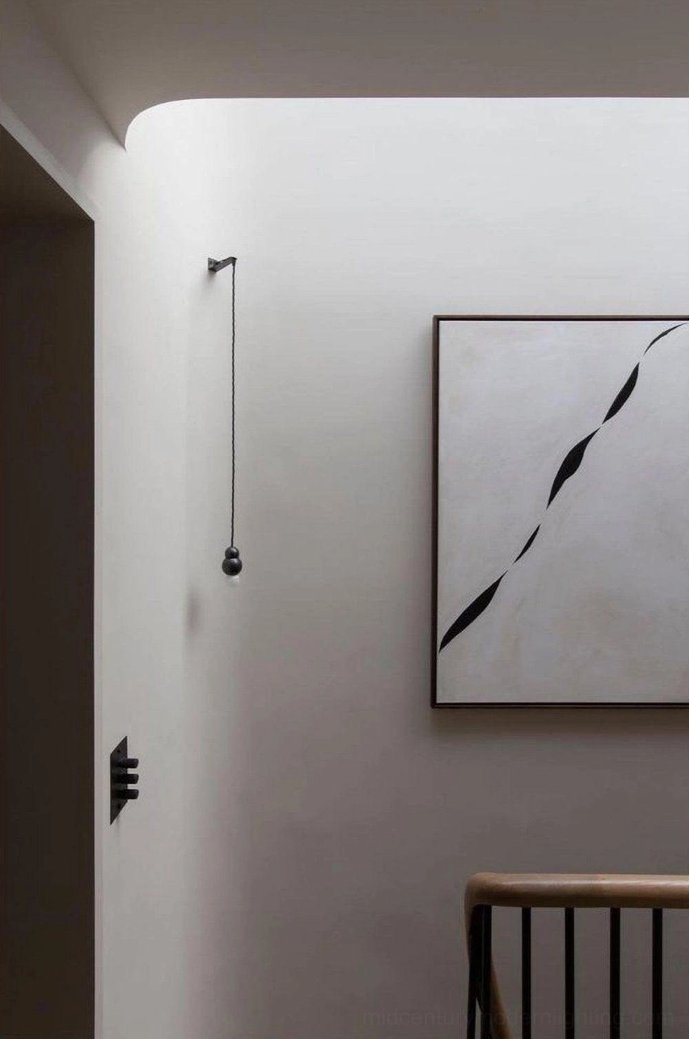 Minimalist black wall sconce, sleek modern bedroom hallway, simple black pendant light design