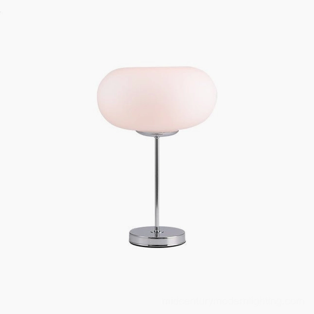 Minimalist frosted glass table lamp with silver metal base, clean modern design aesthetic