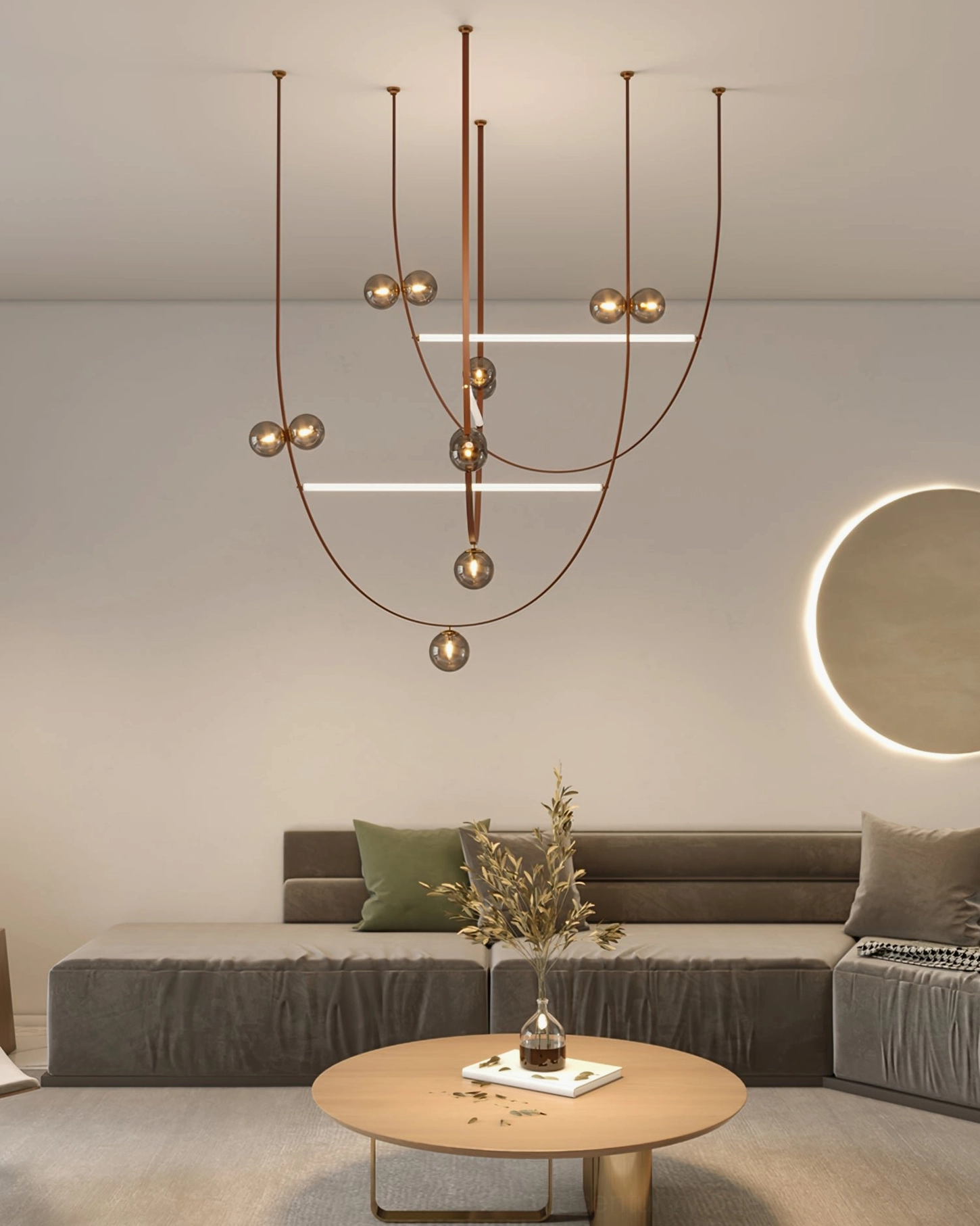 Small minimalist leather ball pendant light in contemporary living room with brown leather straps and glass orbs