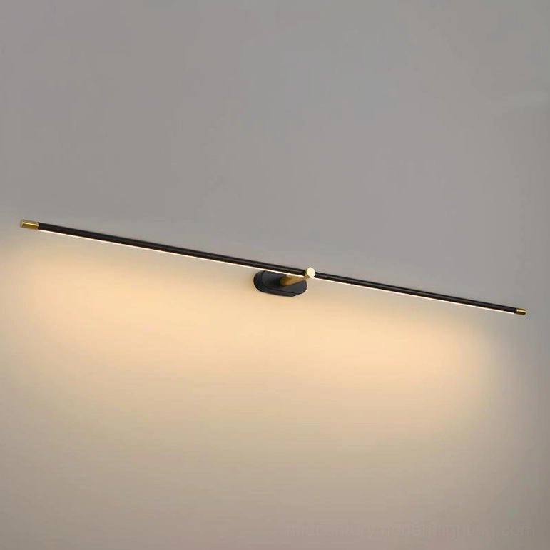 Black and gold minimalist linear wall lamp installed in mid-century modern interior design scheme