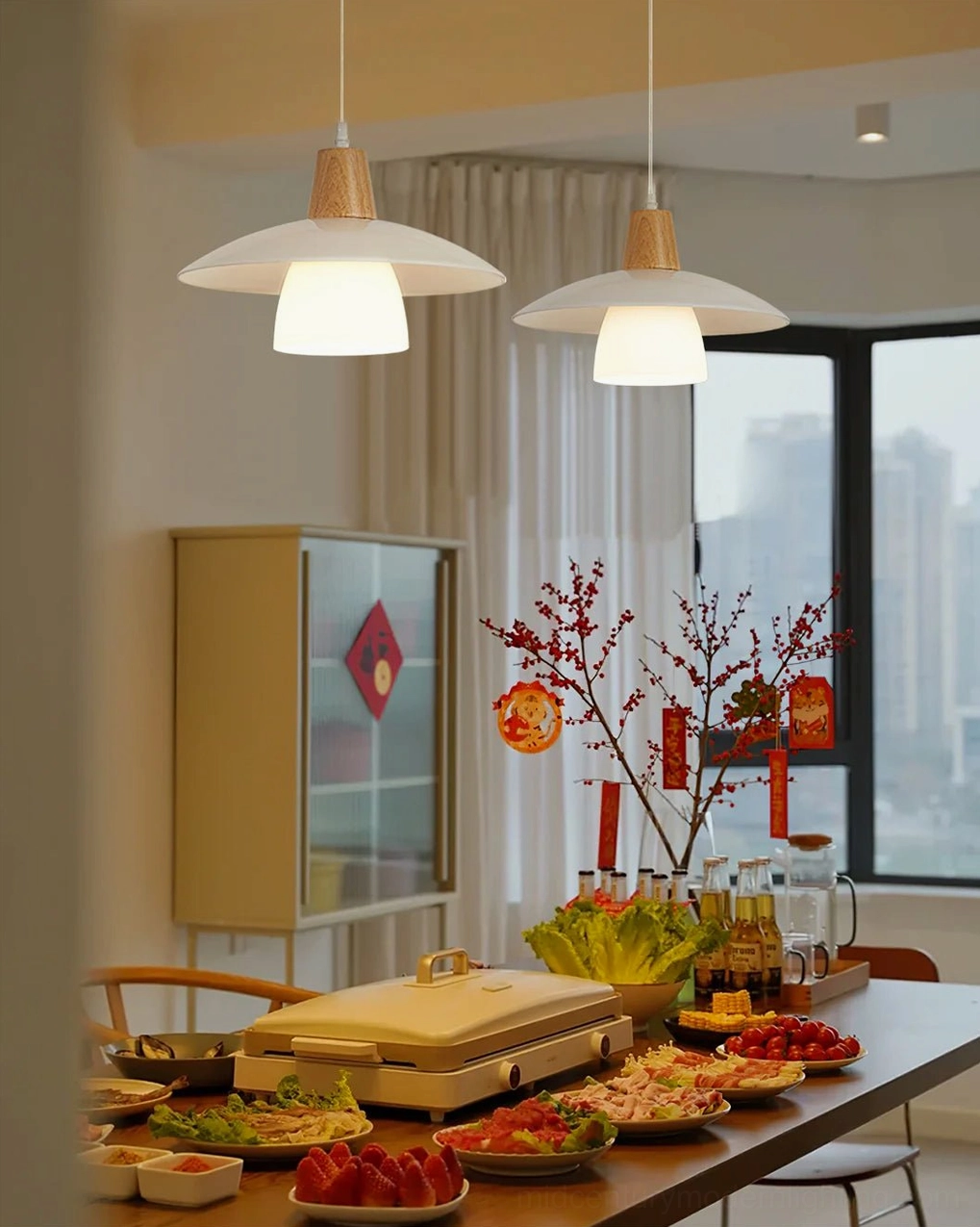 Minimalist wood and glass pendant light creating warm glow in contemporary home interior